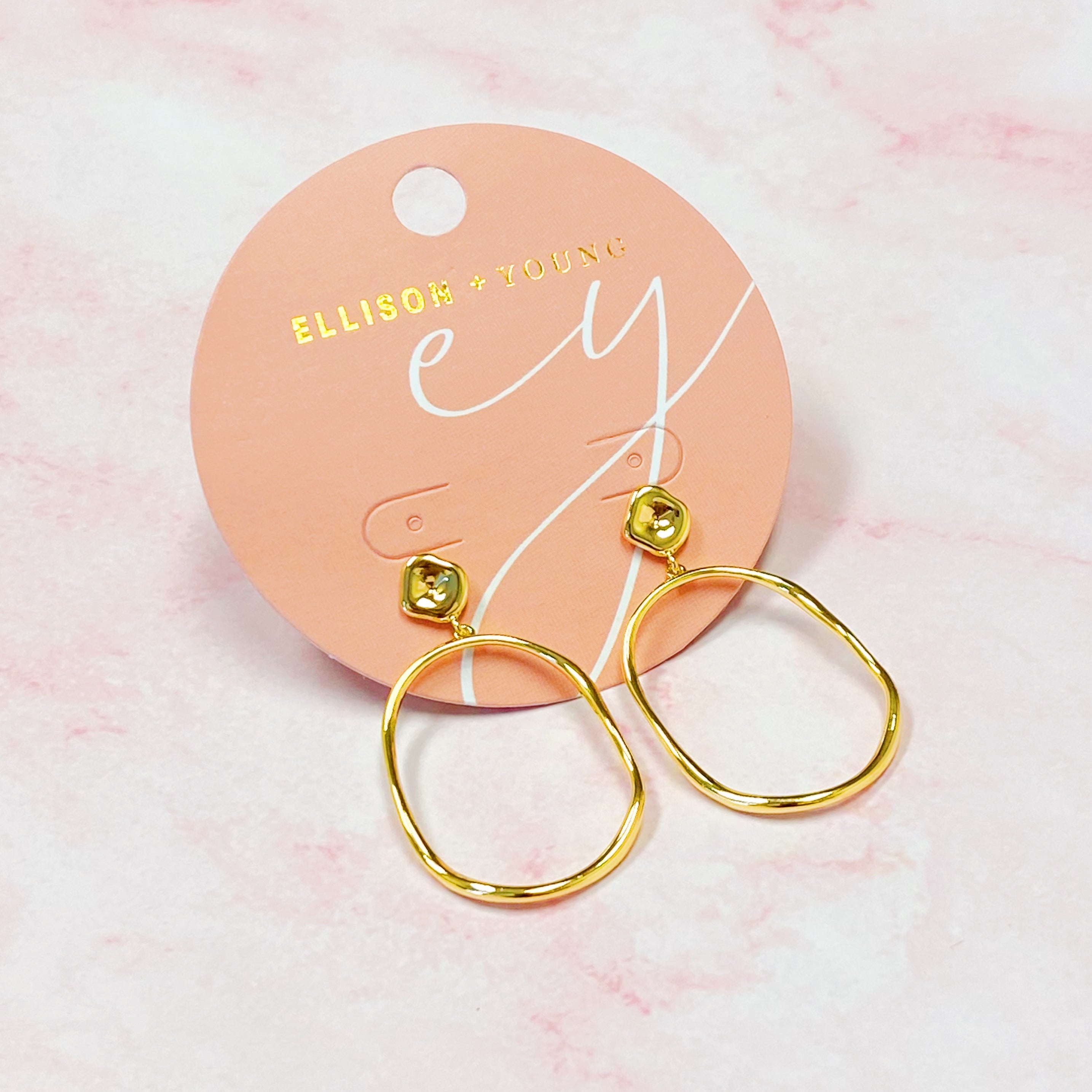 Stylish Modern Molten Oval Drop Earrings in 18K gold plated brass, featuring a chic dangling design.