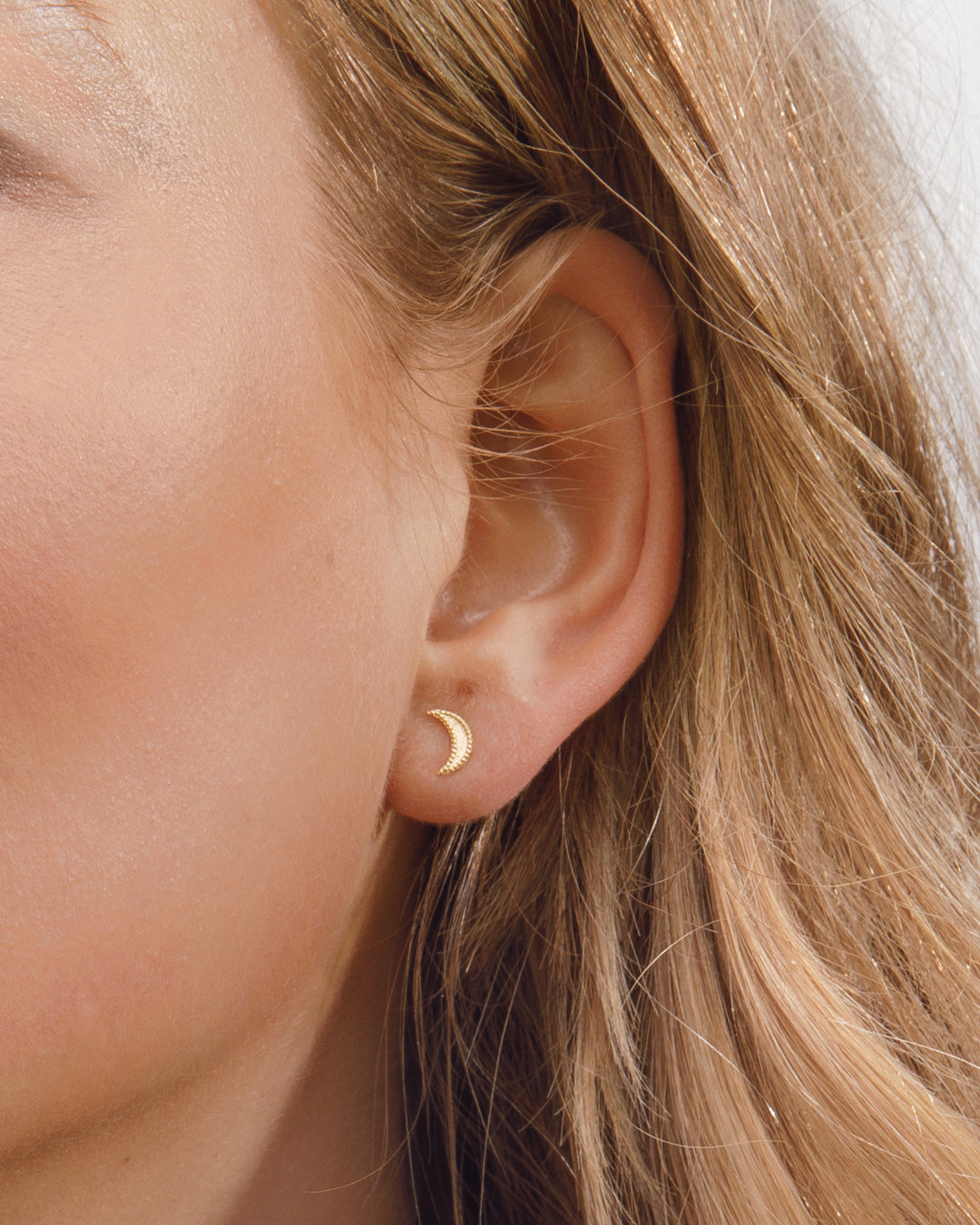 Elegant Moon Charm Studs featuring delicate moon design, perfect for any occasion.