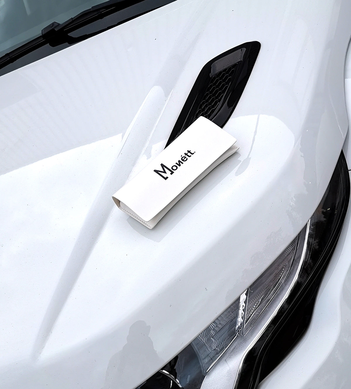 Monett Manifesto Black sunglasses featuring a stylish square frame and gradient lenses, perfect for outdoor activities.