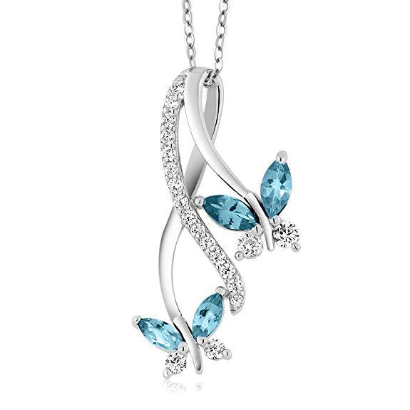 Elegant Mother and Child Butterfly Blue Topaz Necklace in 18K White Gold, featuring a delicate butterfly design and stunning blue topaz gemstone.
