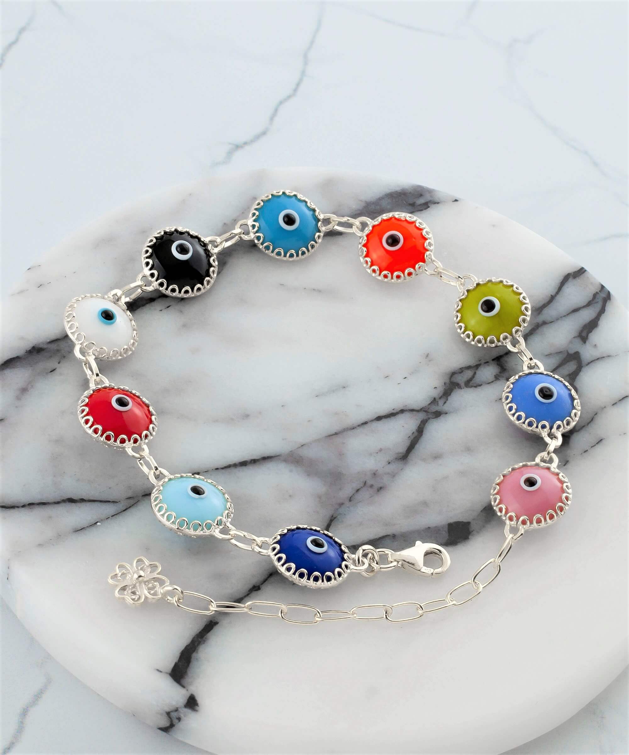 Multi Color Evil Eye Sterling Silver Adjustable Link Bracelet featuring multicolor beads and a strong rolo chain, secured with a lobster claw clasp.