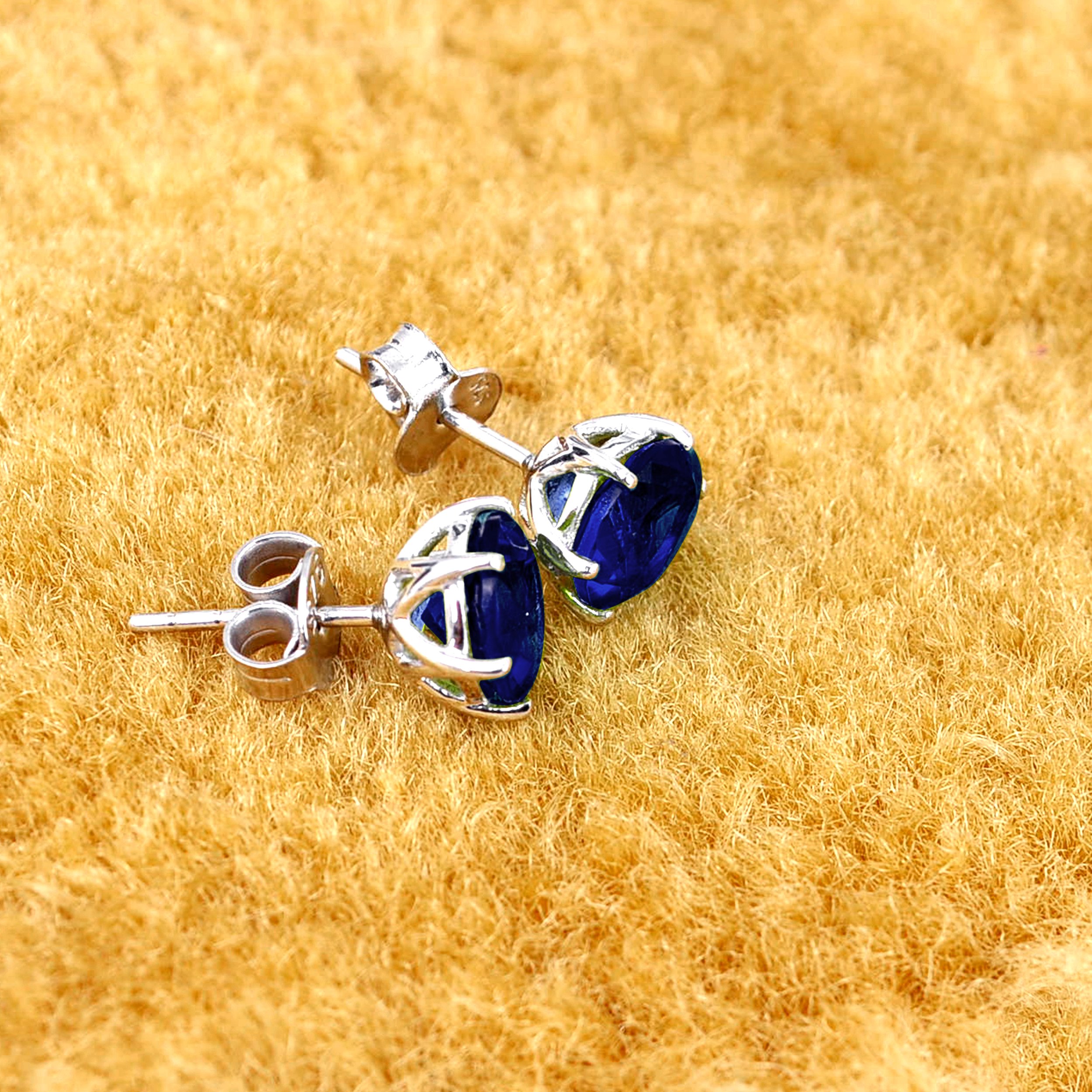 Multi Gemstone Stud Earrings in Sterling Silver featuring vibrant lab-created gemstones set in a high polished finish.