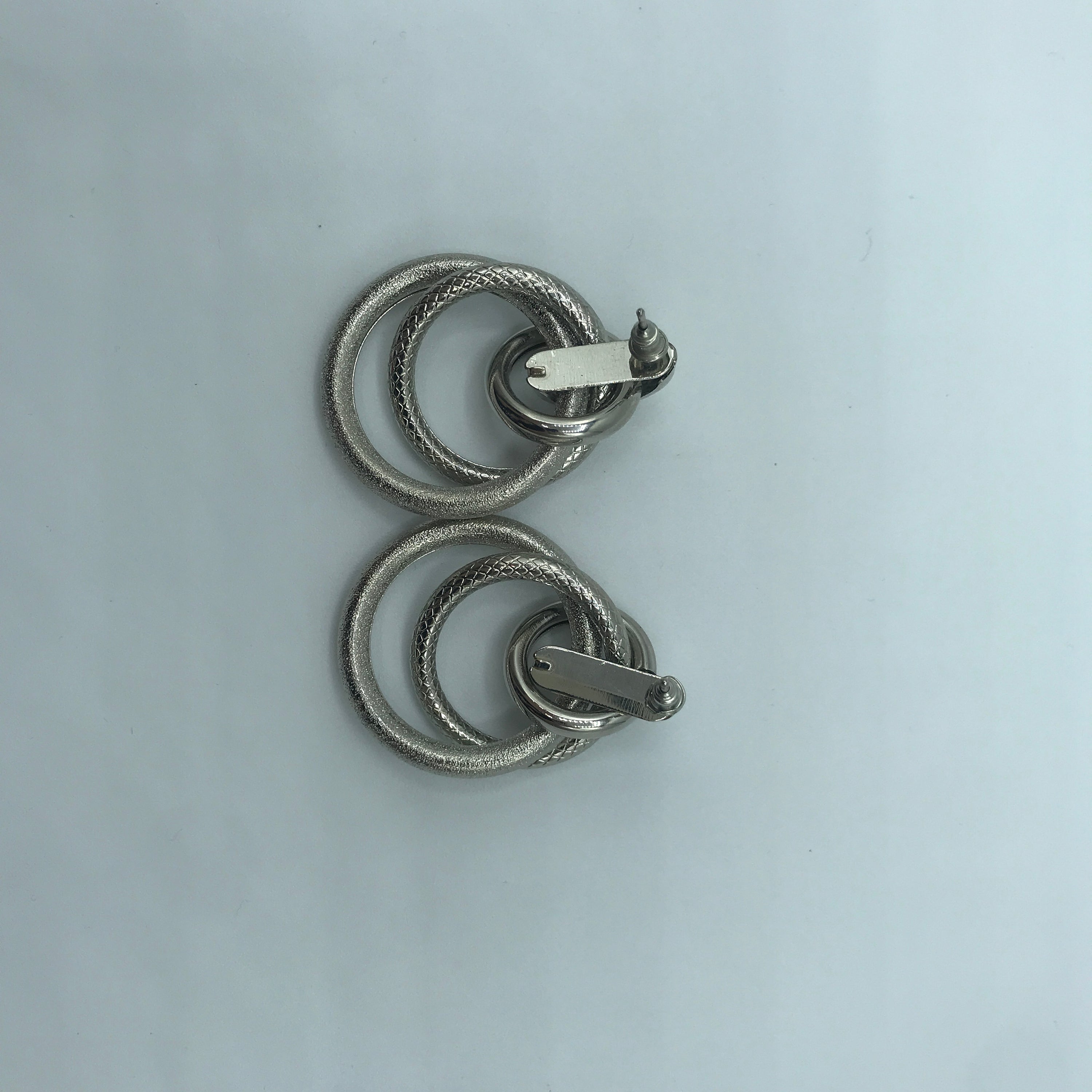 Multi hoop earrings featuring a unique snake pattern, crafted from alloy and steel, measuring 4.5cm in length.