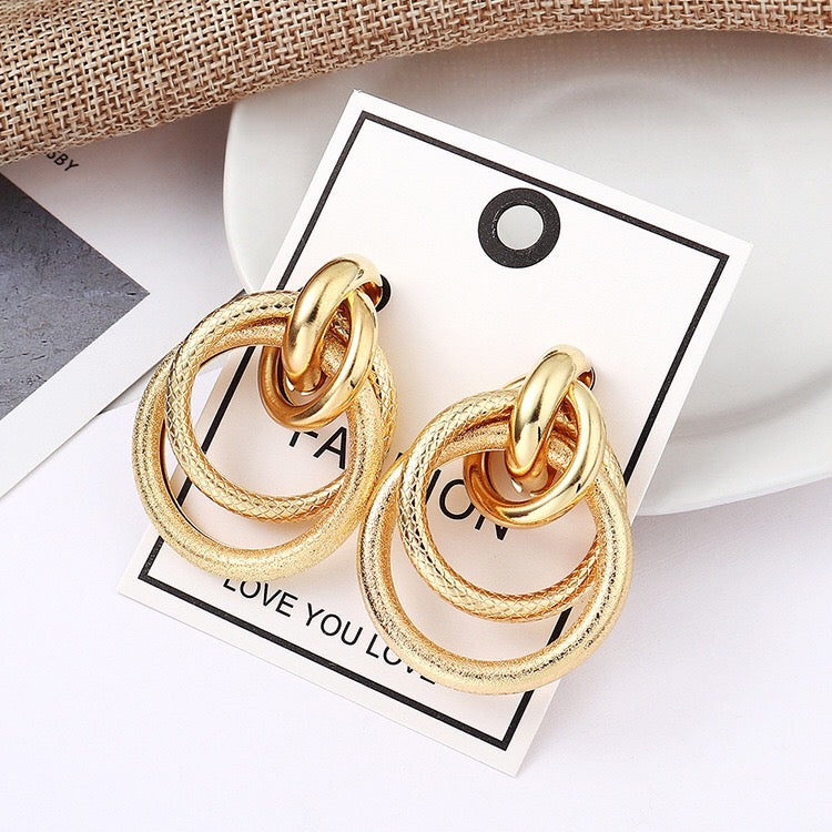 Multi hoop earrings featuring a unique snake pattern, crafted from alloy and steel, measuring 4.5cm in length.