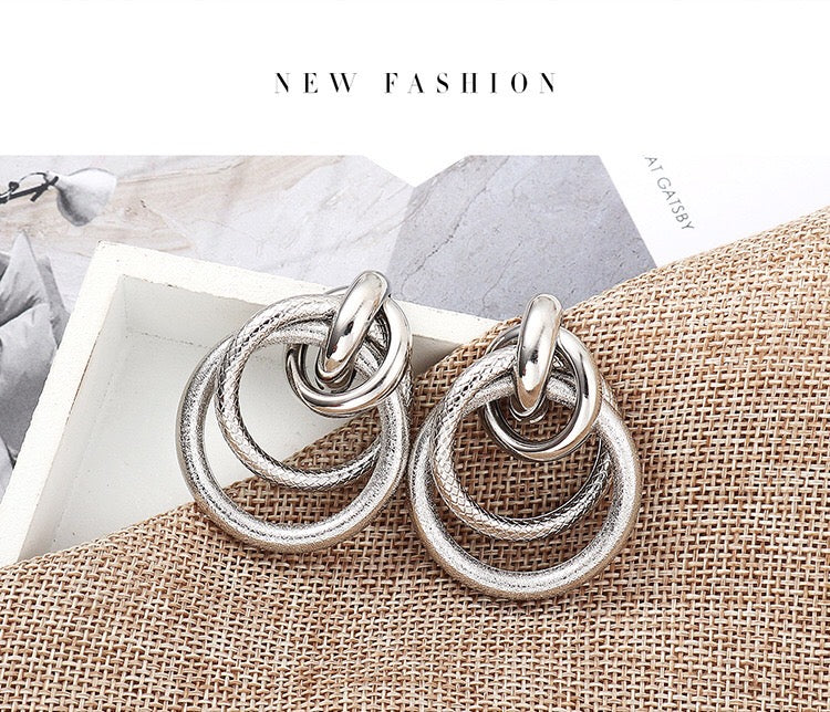 Multi hoop earrings featuring a unique snake pattern, crafted from alloy and steel, measuring 4.5cm in length.