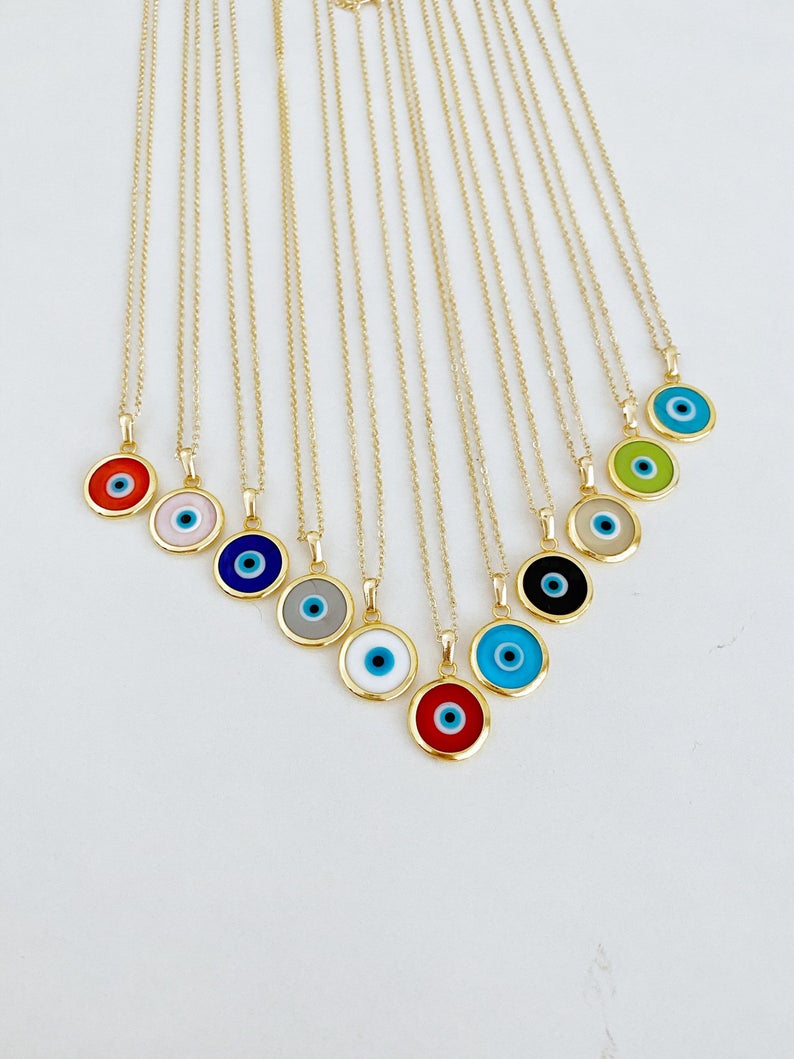 A beautifully handcrafted Murano Evil Eye Necklace featuring vibrant glass beads and a gold stainless steel chain, symbolizing protection and good luck.