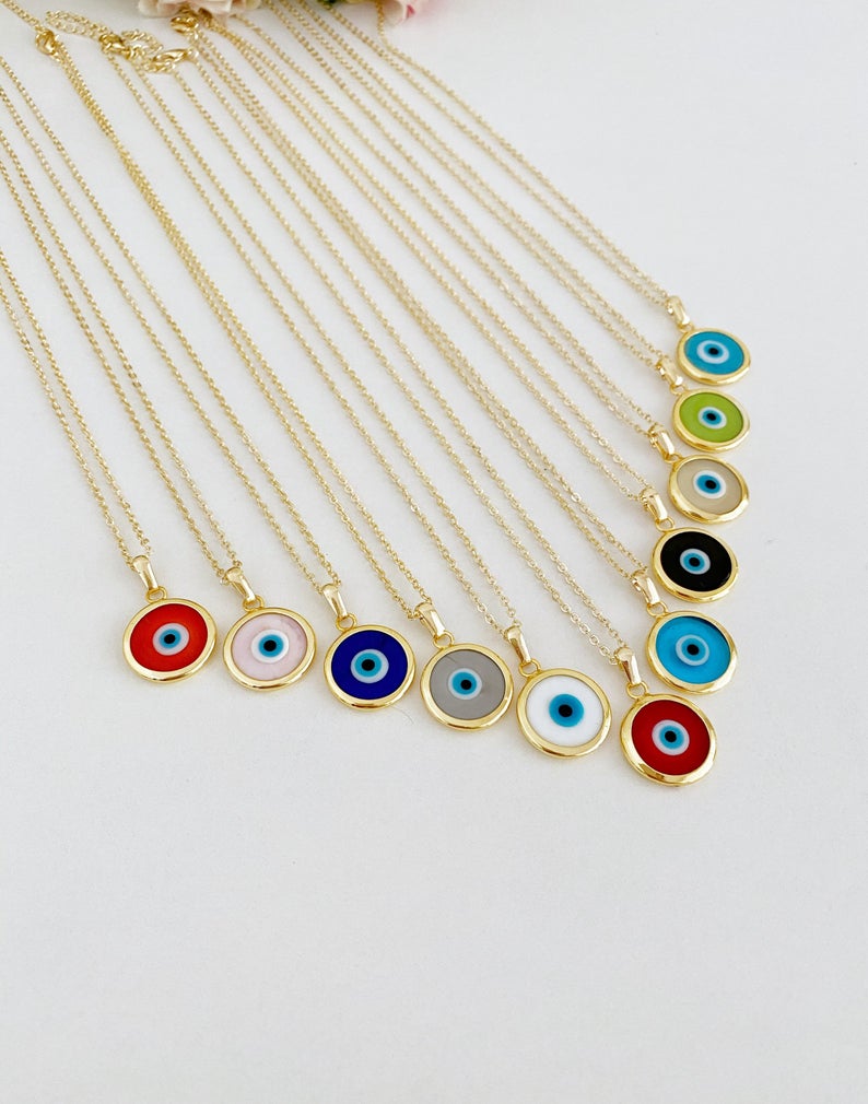 A beautifully handcrafted Murano Evil Eye Necklace featuring vibrant glass beads and a gold stainless steel chain, symbolizing protection and good luck.