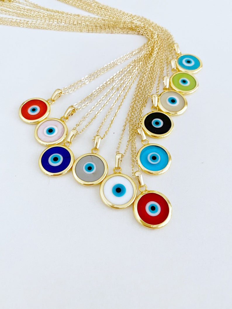 A beautifully handcrafted Murano Evil Eye Necklace featuring vibrant glass beads and a gold stainless steel chain, symbolizing protection and good luck.