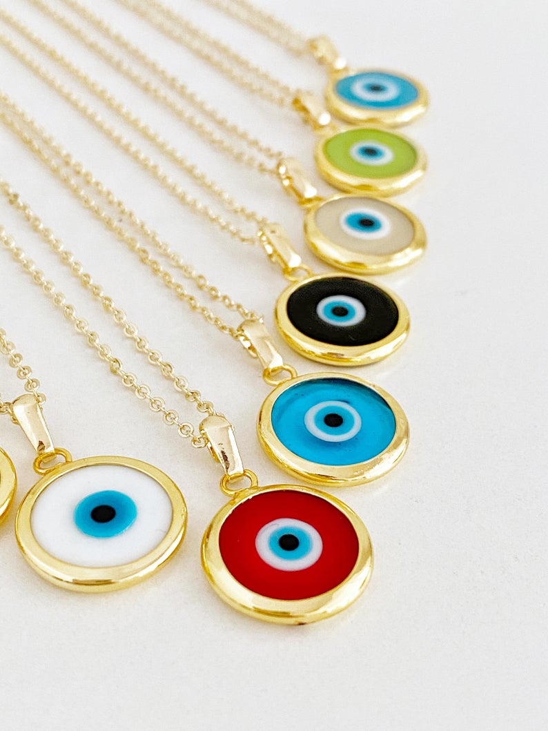 A beautifully handcrafted Murano Evil Eye Necklace featuring vibrant glass beads and a gold stainless steel chain, symbolizing protection and good luck.