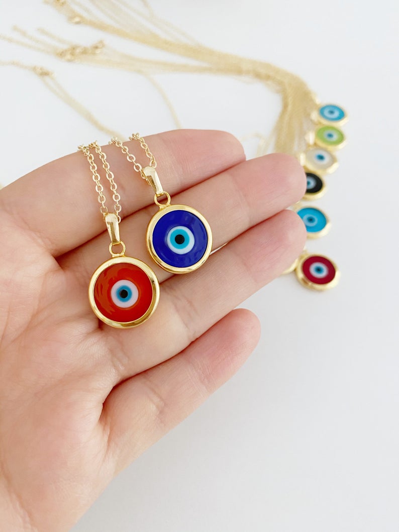 A beautifully handcrafted Murano Evil Eye Necklace featuring vibrant glass beads and a gold stainless steel chain, symbolizing protection and good luck.