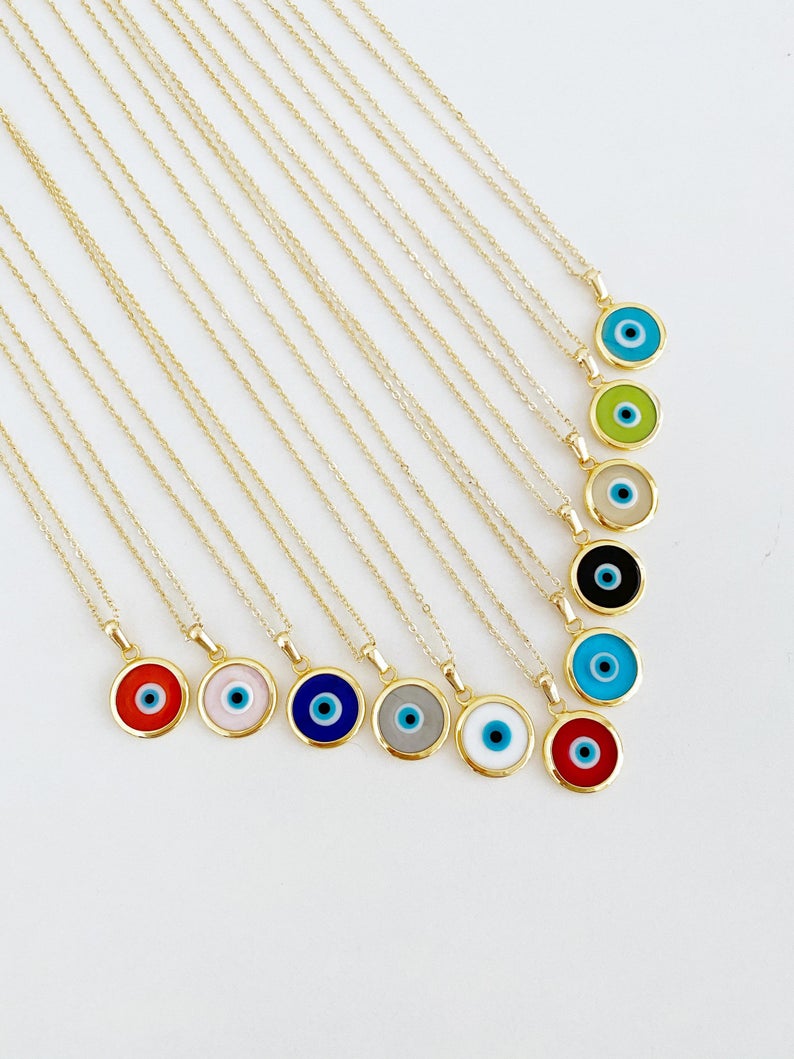 A beautifully handcrafted Murano Evil Eye Necklace featuring vibrant glass beads and a gold stainless steel chain, symbolizing protection and good luck.