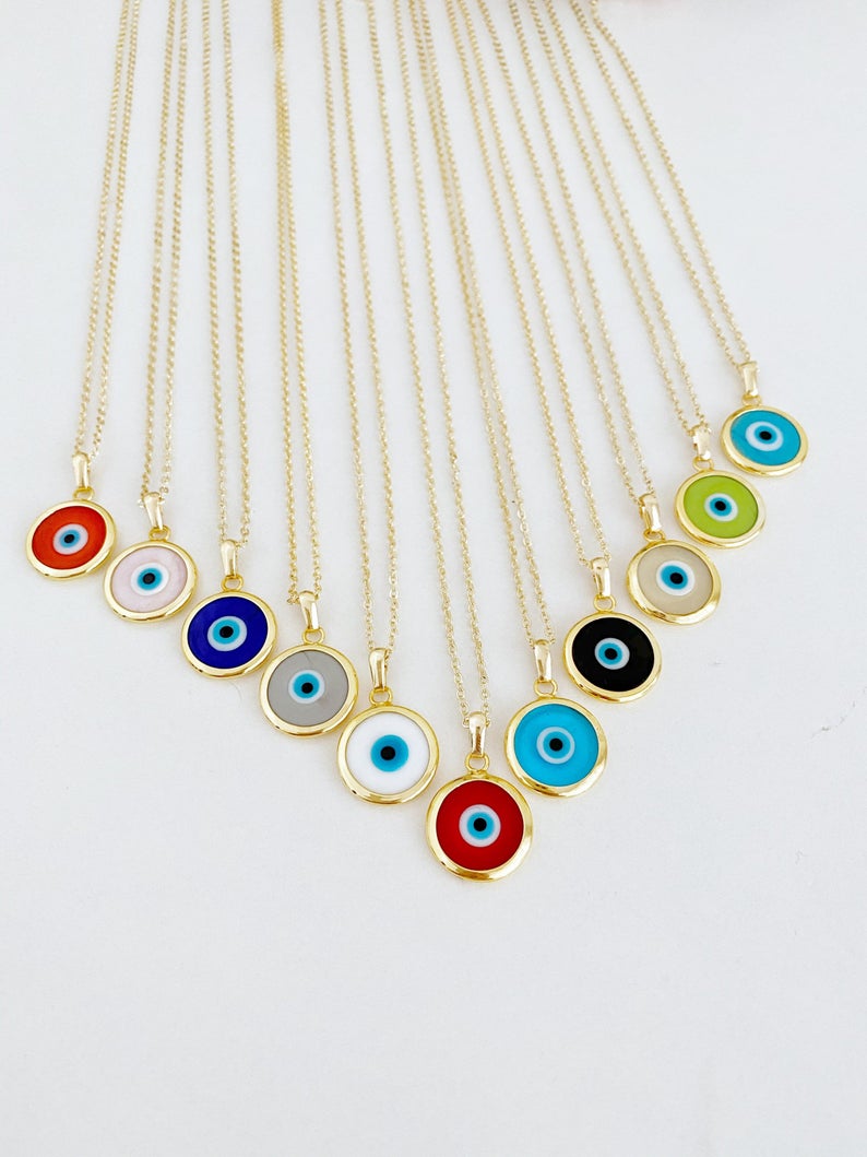 A beautifully handcrafted Murano Evil Eye Necklace featuring vibrant glass beads and a gold stainless steel chain, symbolizing protection and good luck.