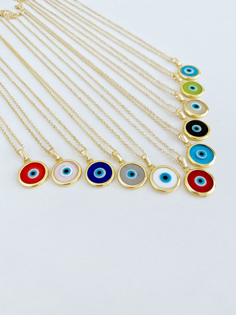 A beautifully handcrafted Murano Evil Eye Necklace featuring vibrant glass beads and a gold stainless steel chain, symbolizing protection and good luck.
