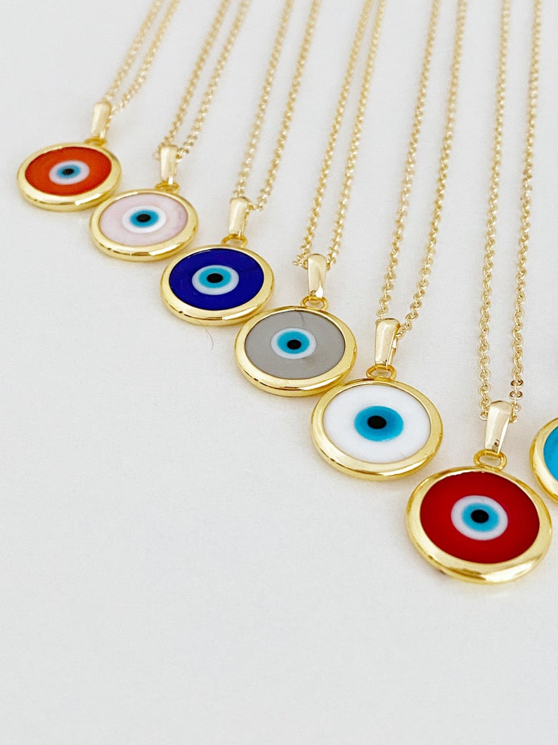 A beautifully handcrafted Murano Evil Eye Necklace featuring vibrant glass beads and a gold stainless steel chain, symbolizing protection and good luck.