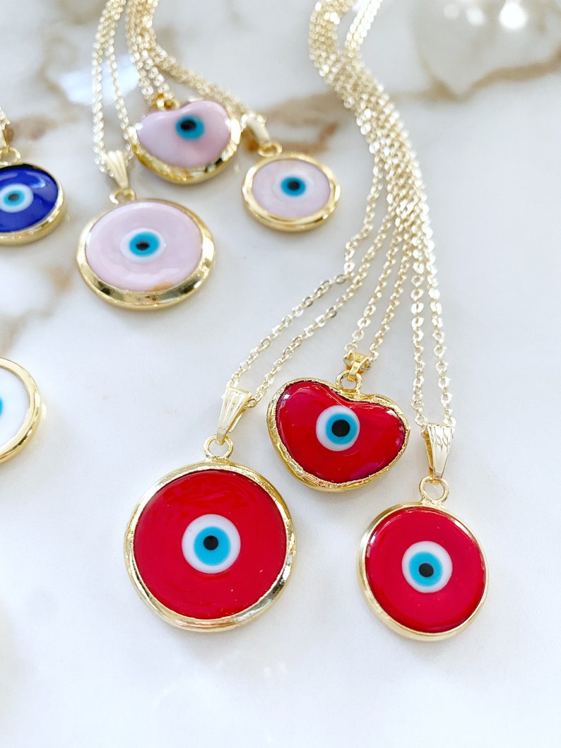 A stunning Murano Evil Eye Necklace featuring colorful handmade glass beads and a gold stainless steel chain, symbolizing protection and good luck.