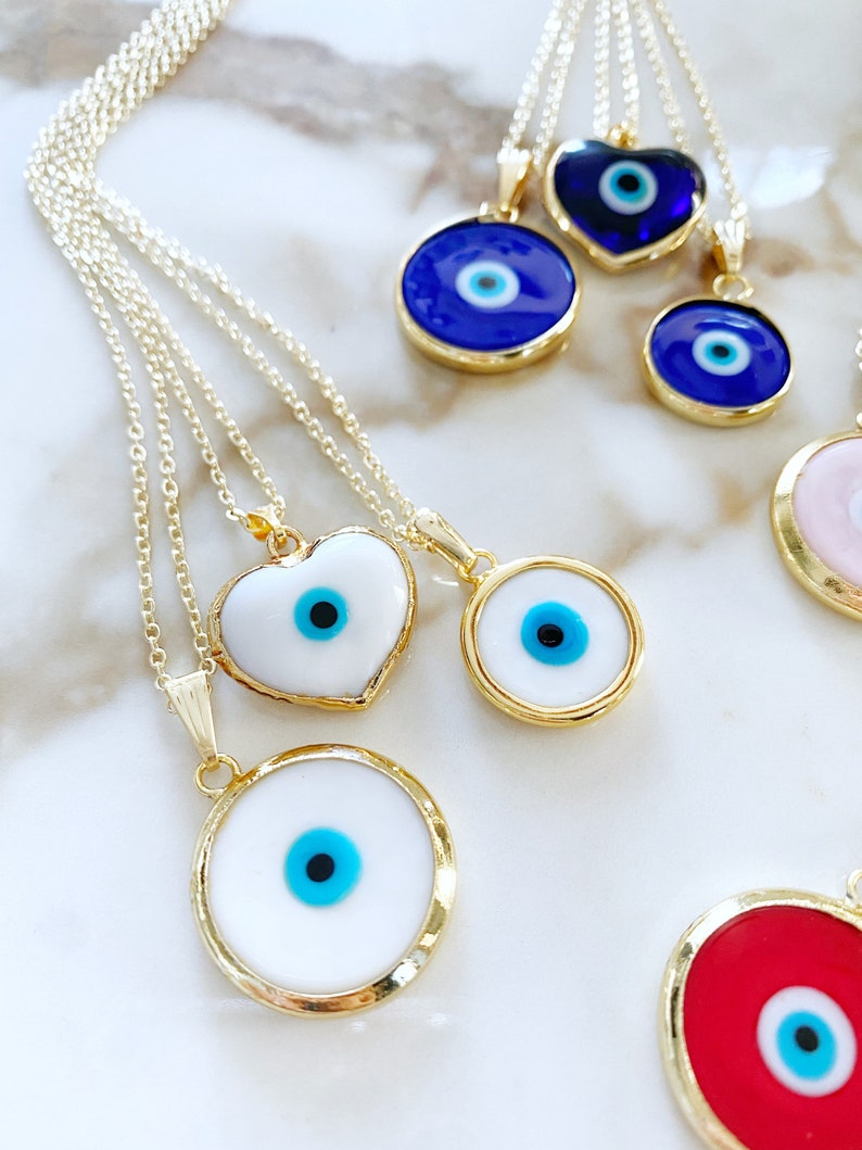 A stunning Murano Evil Eye Necklace featuring colorful handmade glass beads and a gold stainless steel chain, symbolizing protection and good luck.