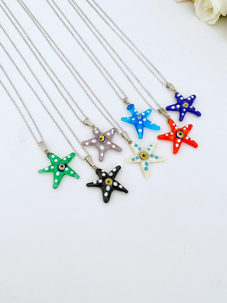 Murano Evil Eye Necklace featuring a handmade glass starfish pendant in vibrant colors, set on a stainless steel gold chain.