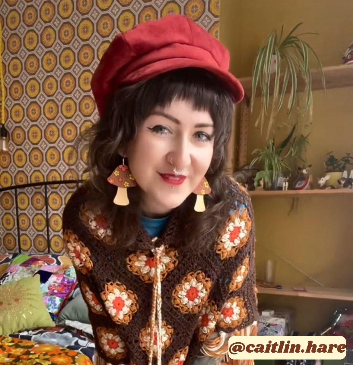 A pair of handcrafted wooden mushroom earrings featuring floral designs, made from sustainable Birch Plywood, available in various sizes.