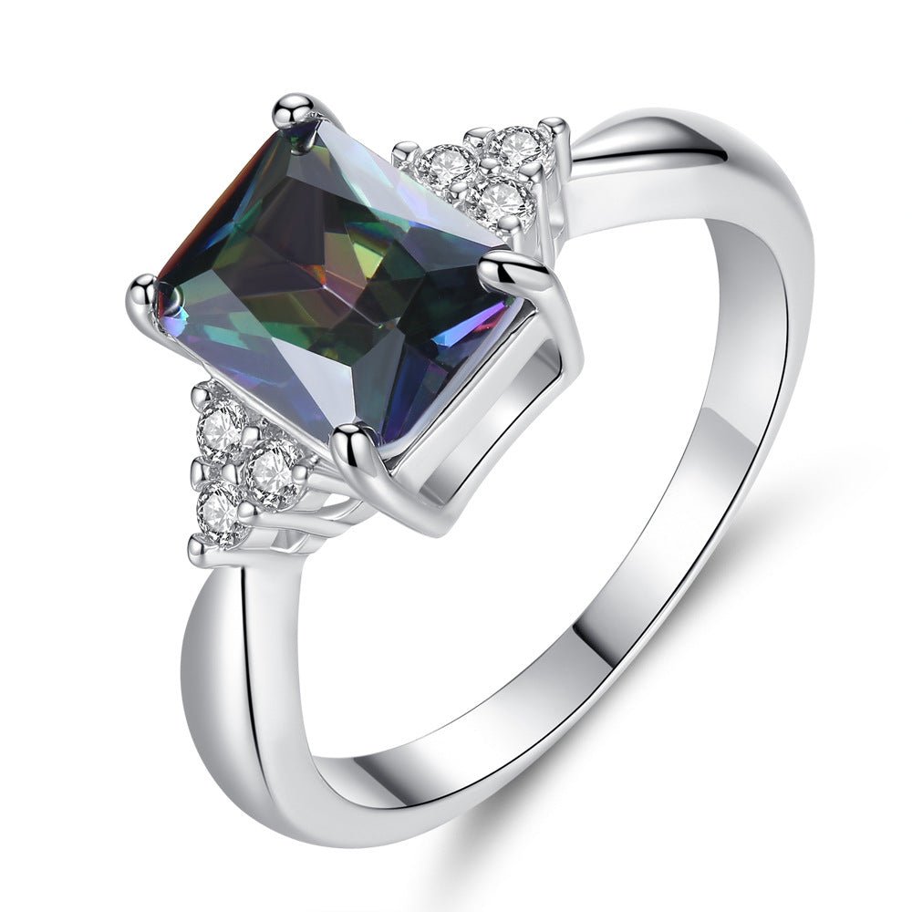 Elegant Mystic Topaz Ring featuring a 2.5 ct princess cut gemstone set in 18k white gold plating with AAA+ cubic zirconia accents.