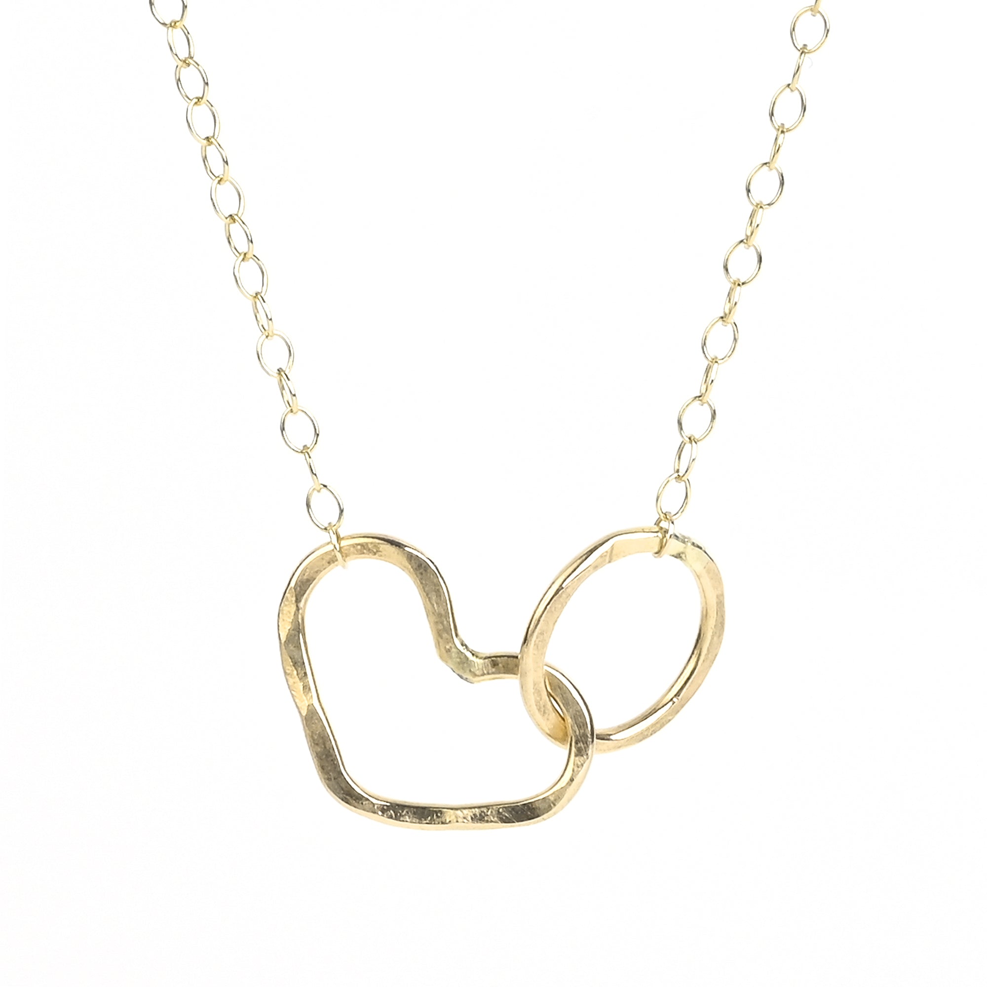 Namaste Necklace featuring a hammered heart and circle infinity design, symbolizing love and unity, handmade in California.