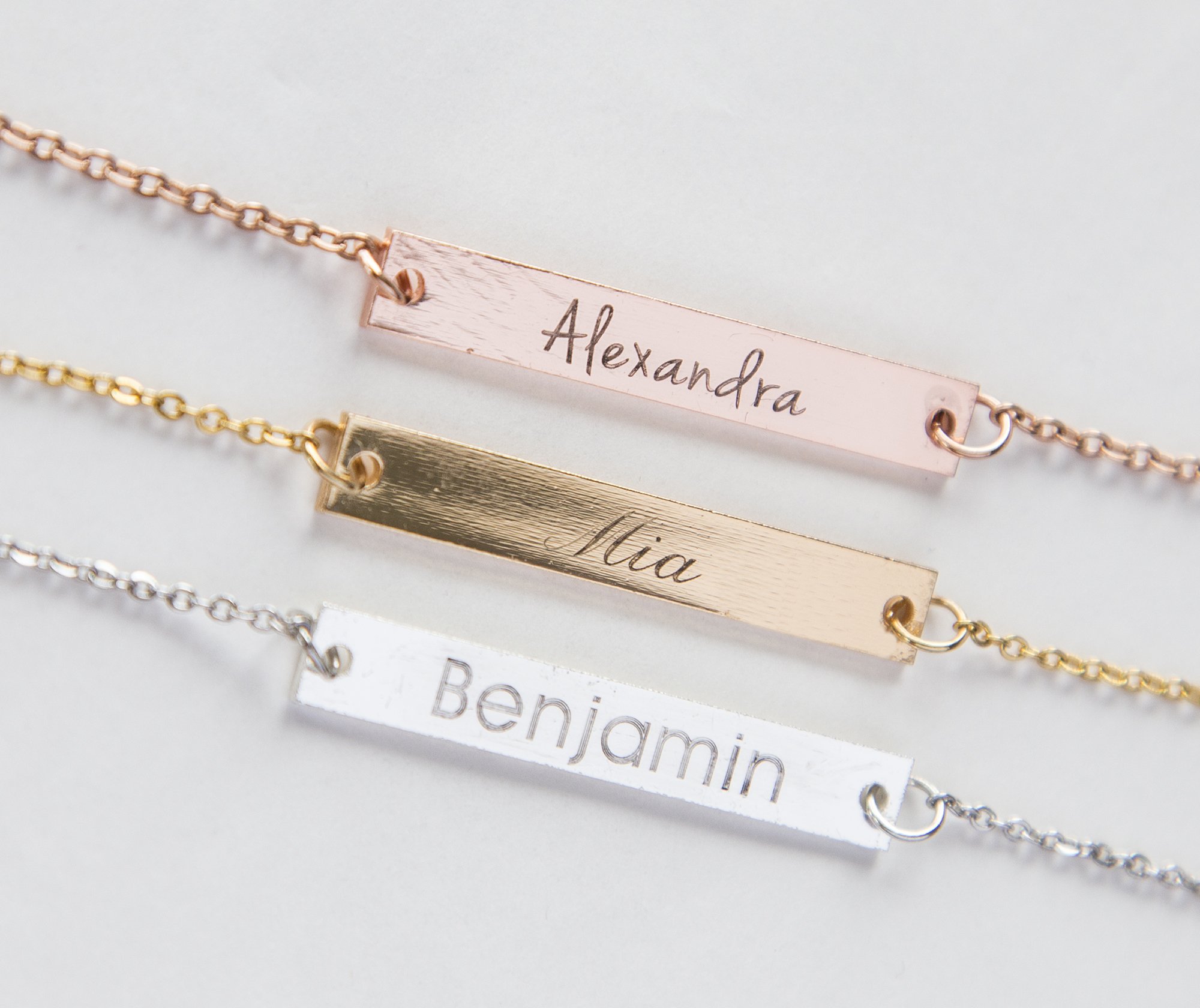 Personalized Name Bar Necklace featuring a copper bar with silver, rose gold, or gold plating on a durable stainless steel chain.