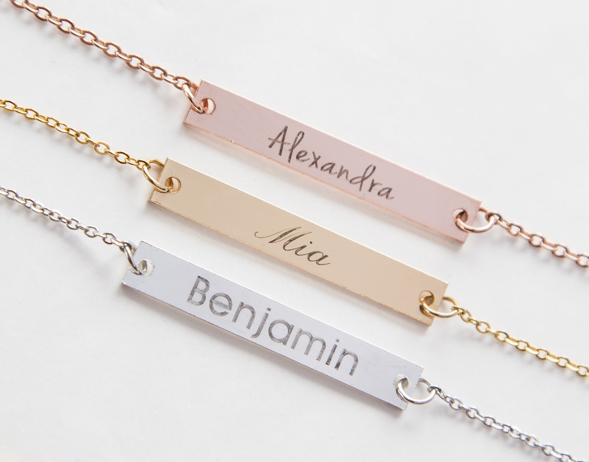 Personalized Name Bar Necklace featuring a copper bar with silver, rose gold, or gold plating on a durable stainless steel chain.