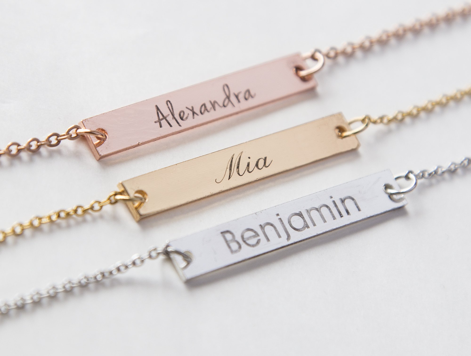 Personalized Name Bar Necklace featuring a copper bar with silver, rose gold, or gold plating on a durable stainless steel chain.