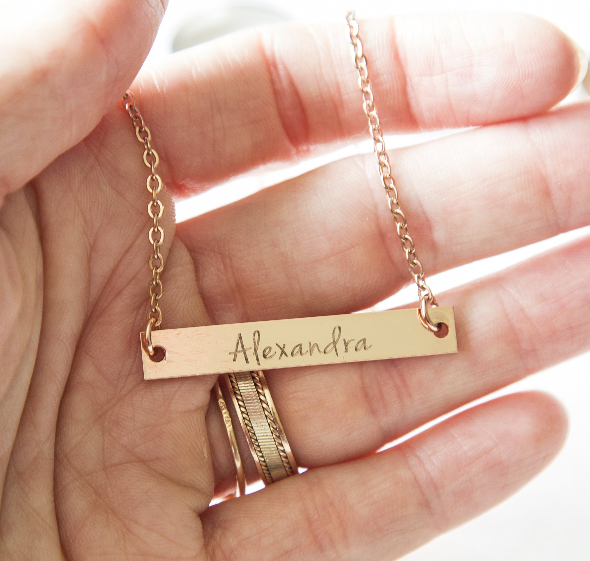 Personalized Name Bar Necklace featuring a copper bar with silver, rose gold, or gold plating on a durable stainless steel chain.