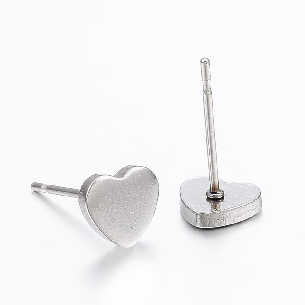 Nanna Silver Heart Stud Earrings made from hypoallergenic 304 stainless steel, elegantly designed and presented on a gift card.