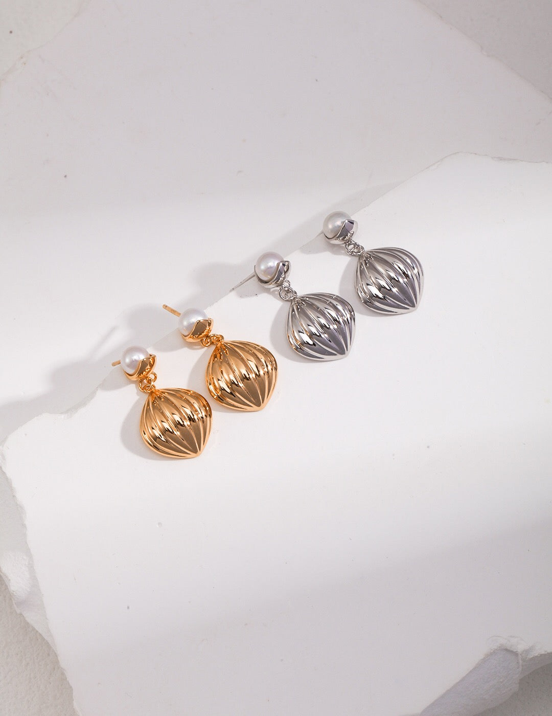 Natural Pearl Pumpkin Shape Drop Earrings featuring gold vermeil, showcasing their elegant design and craftsmanship.