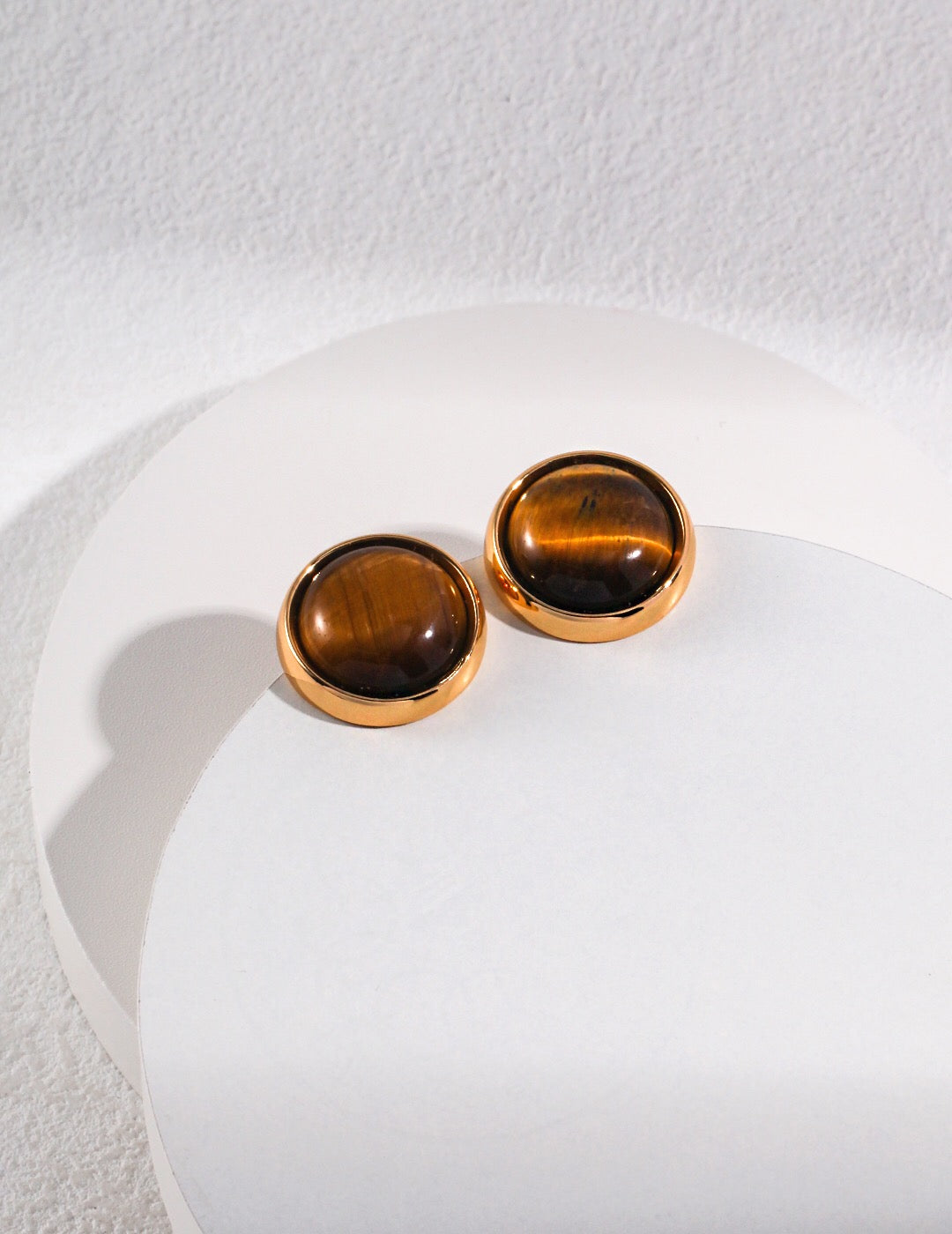 Natural Round Tiger Eye Stone Stud Earrings set in gold vermeil, showcasing unique patterns and a luxurious finish.