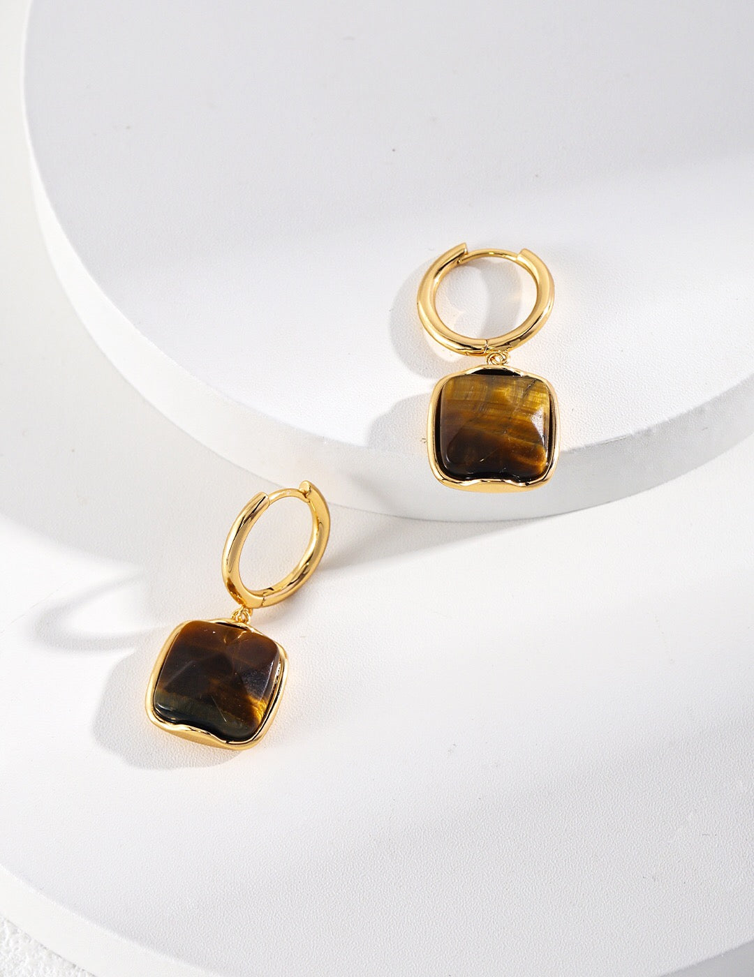 Natural Tiger Eye Stone Dangle Earrings featuring gold vermeil, showcasing their unique design and elegant craftsmanship.