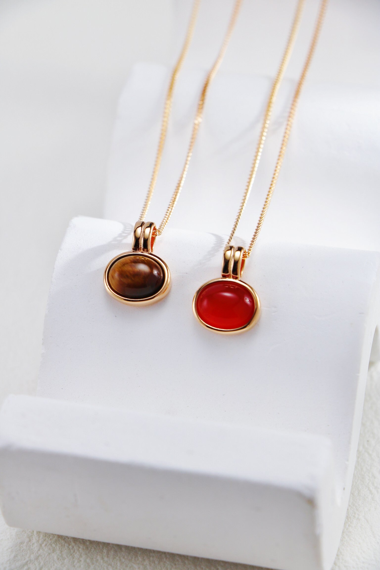 Natural Tiger Eye Stone and Red Agate Necklace featuring gold vermeil accents, showcasing its unique stones and elegant design.