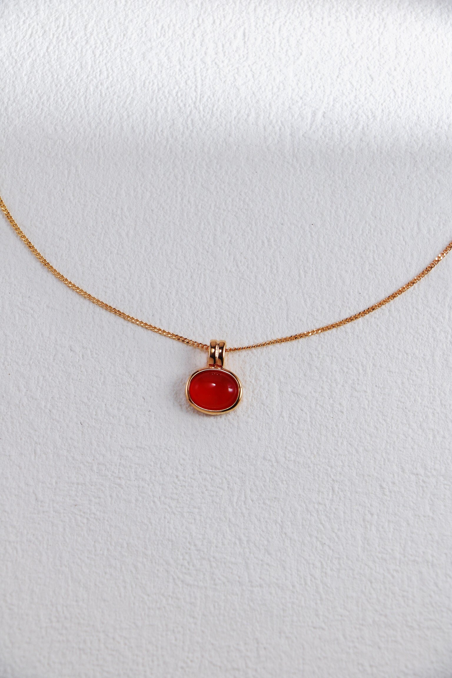 Natural Tiger Eye Stone and Red Agate Necklace featuring gold vermeil accents, showcasing its unique stones and elegant design.
