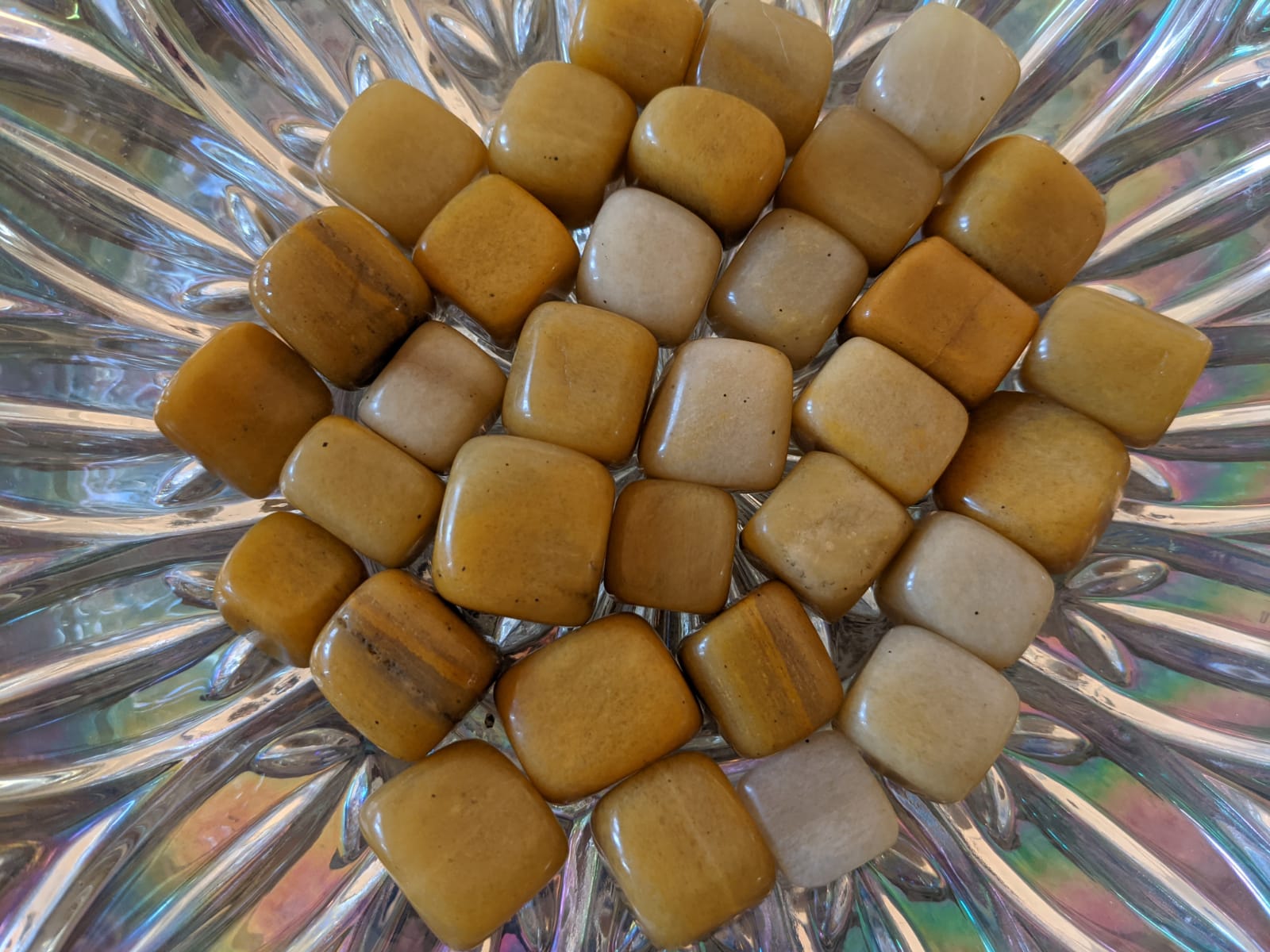 Natural Yellow Jasper Gemstone Tumbles, vibrant yellow stones sized 20-25mm, perfect for chakra activation and grounding.