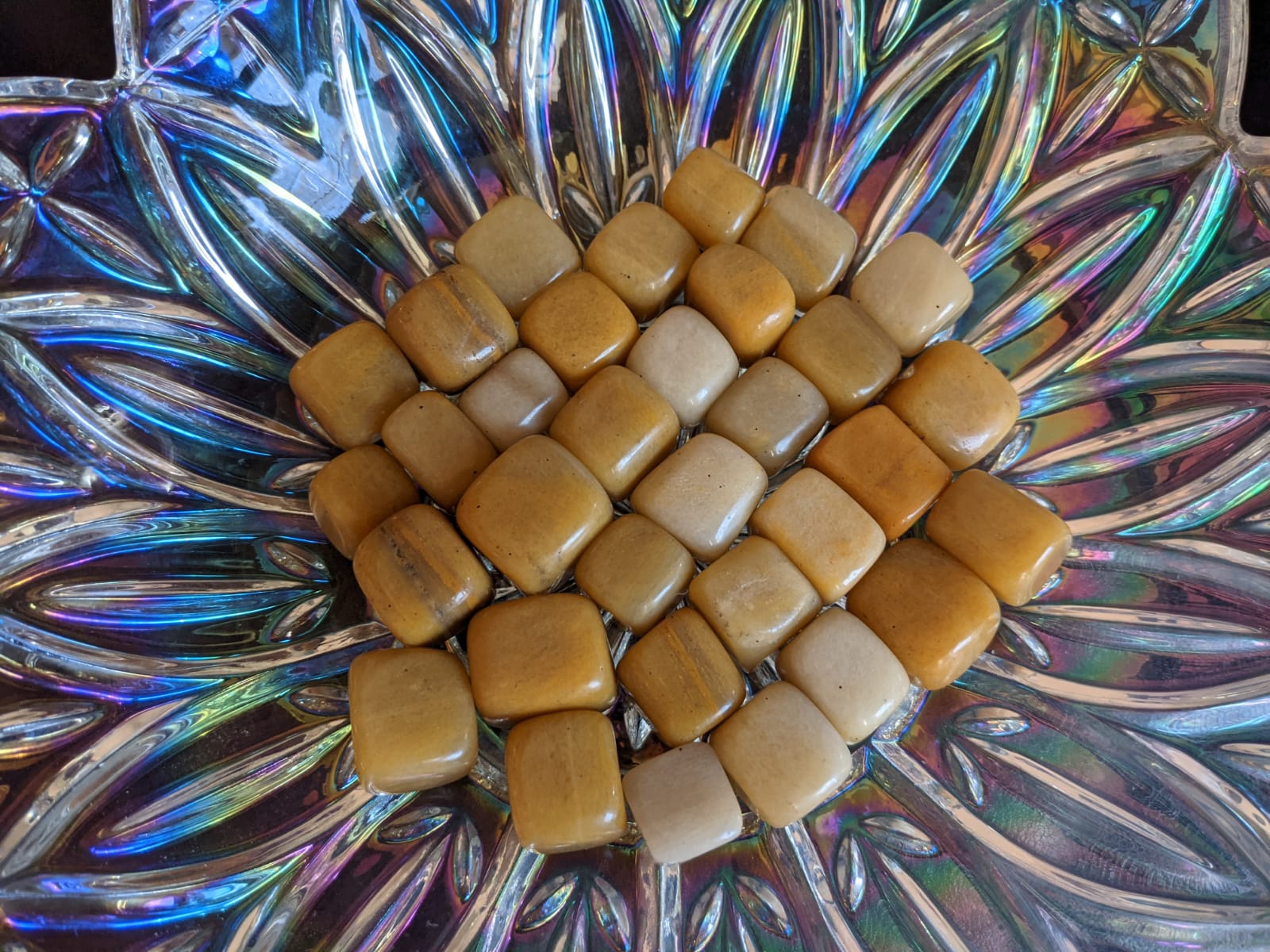 Natural Yellow Jasper Gemstone Tumbles, vibrant yellow stones sized 20-25mm, perfect for chakra activation and grounding.