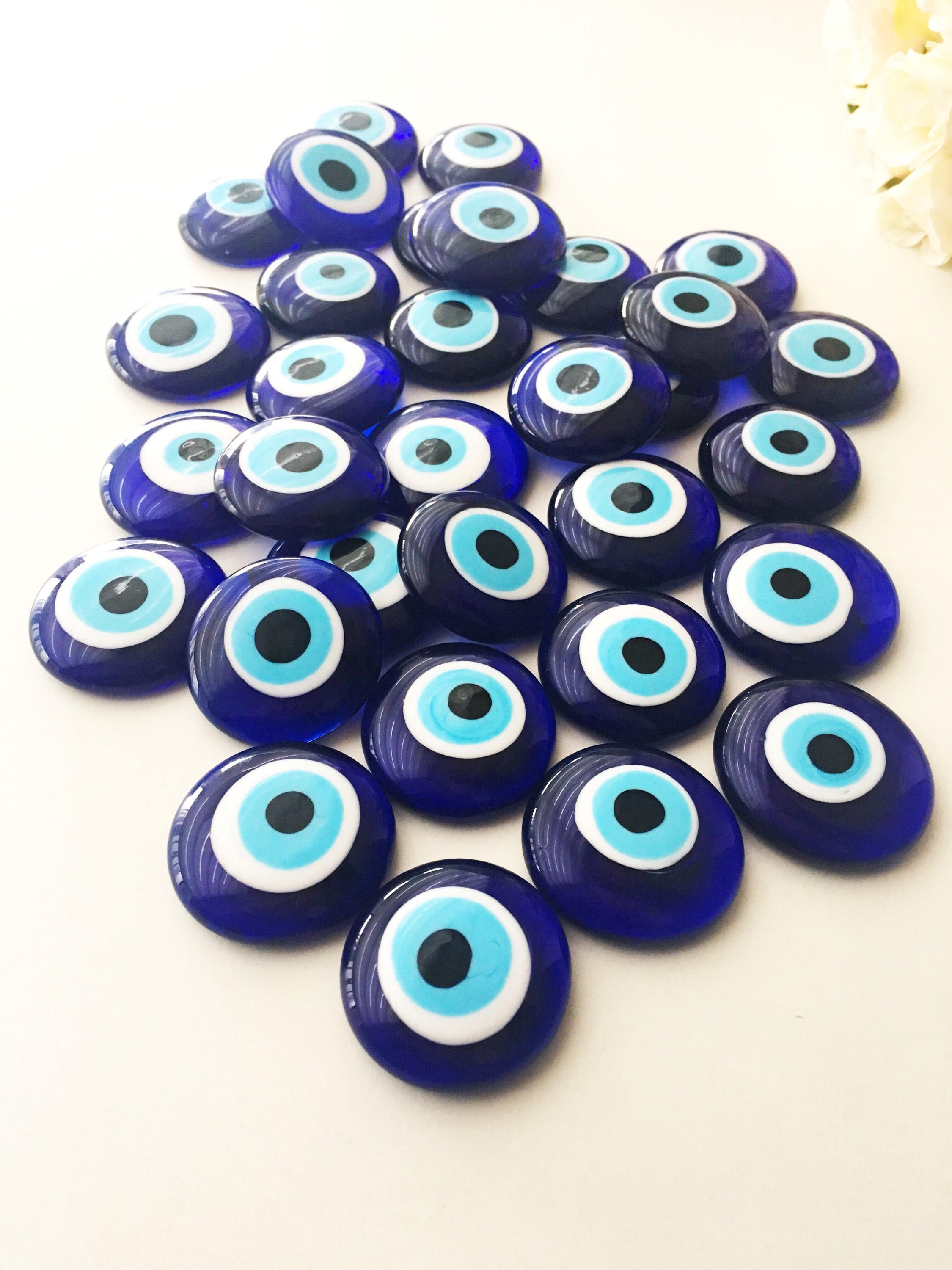 Two blue glass Nazar boncuk evil eye beads, 4cm each, with no hole, perfect for home decor and protection against negativity.