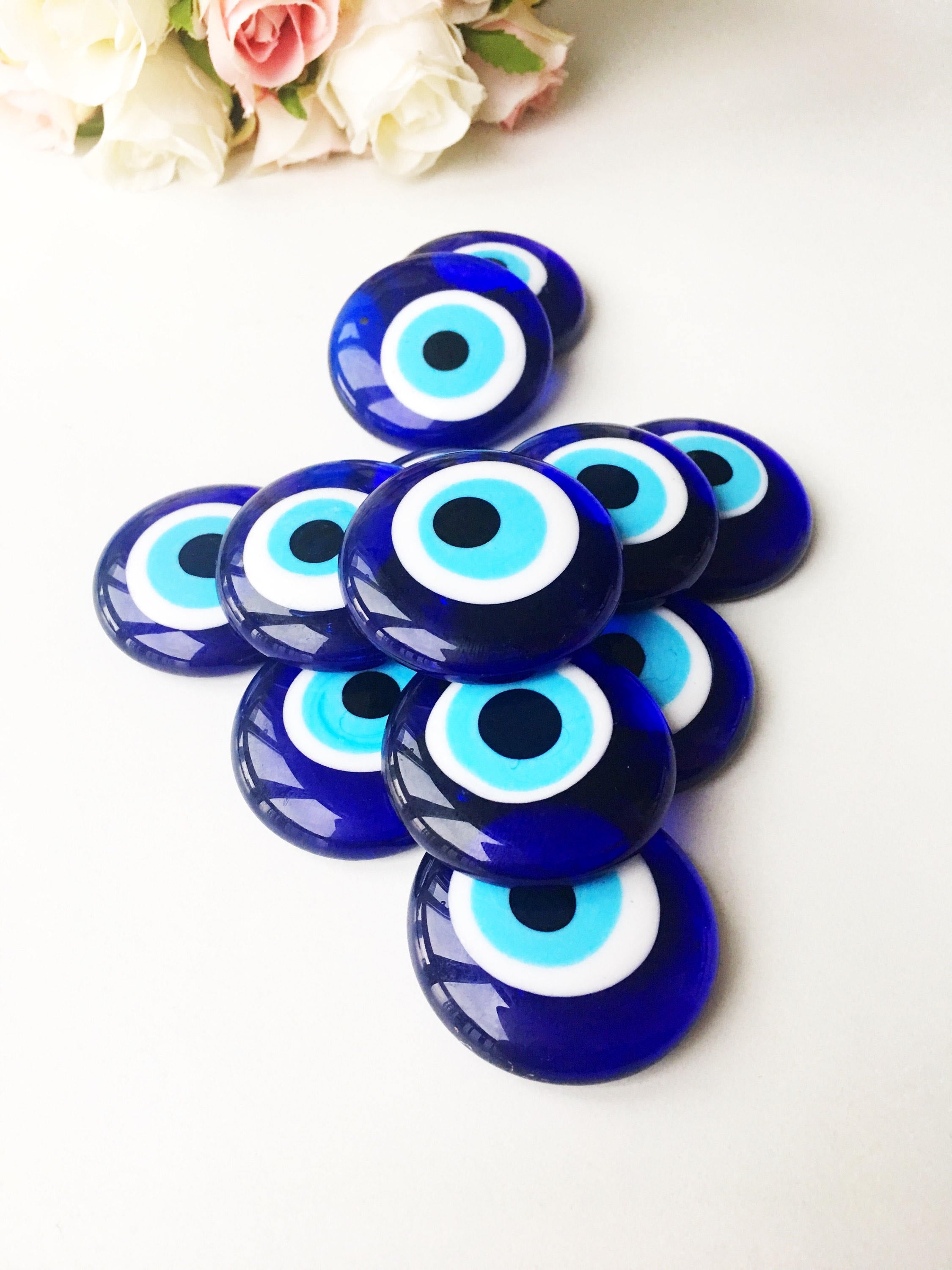 Two blue glass Nazar boncuk evil eye beads, 4cm each, with no hole, perfect for home decor and protection against negativity.