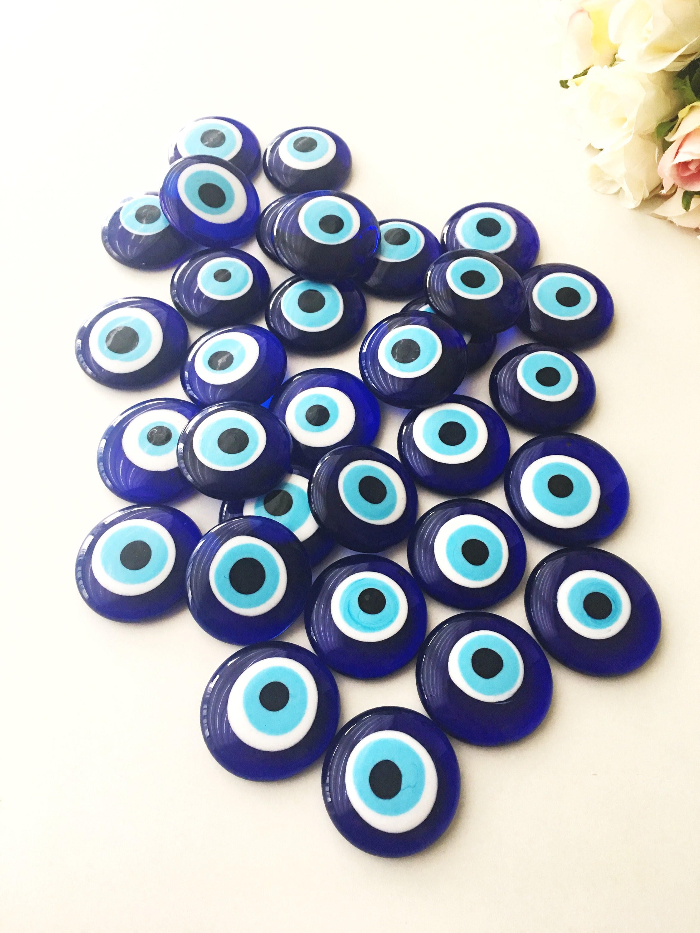 Two blue glass Nazar boncuk evil eye beads, 4cm each, with no hole, perfect for home decor and protection against negativity.