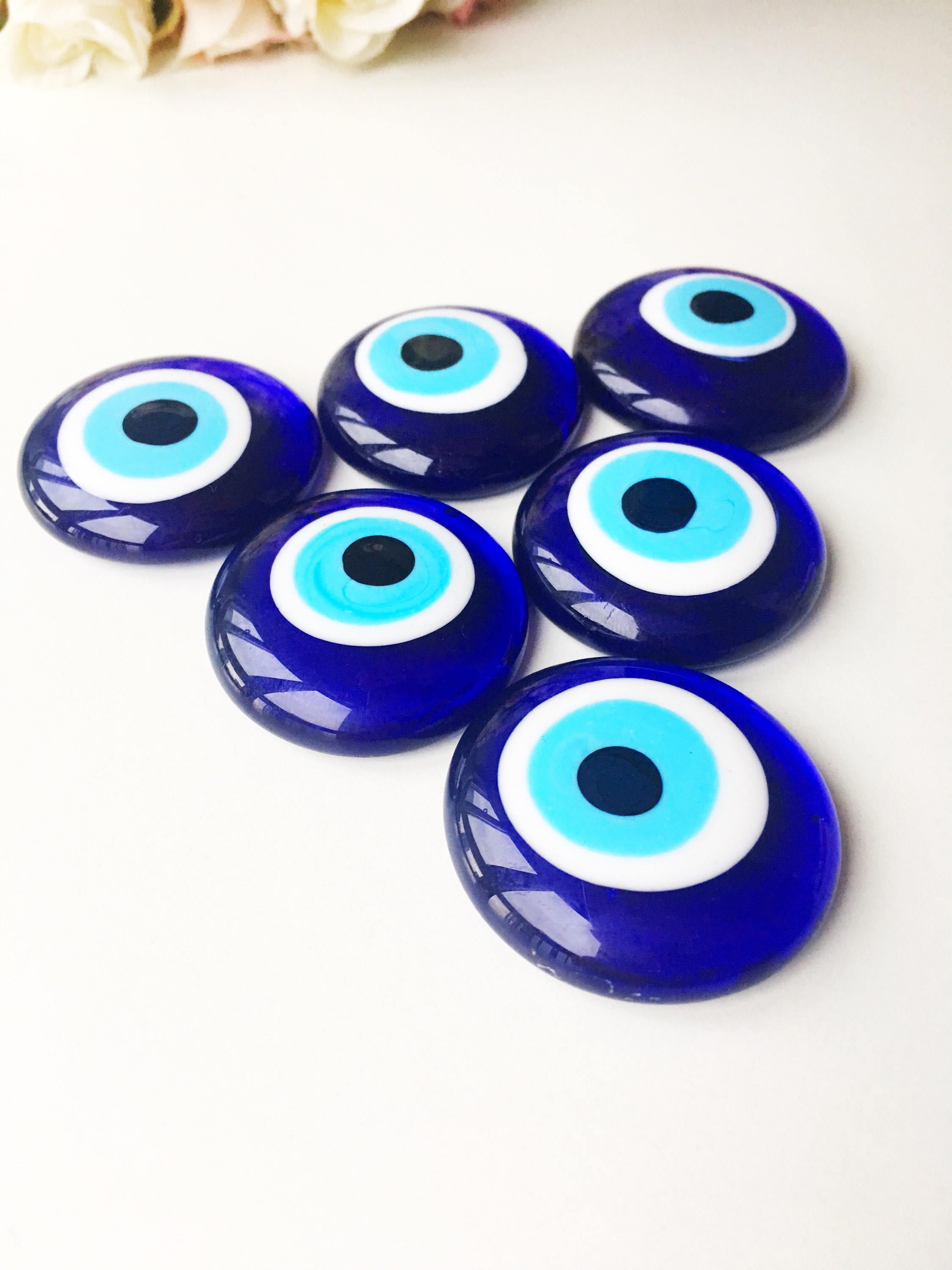 Two blue glass Nazar boncuk evil eye beads, 4cm each, with no hole, perfect for home decor and protection against negativity.