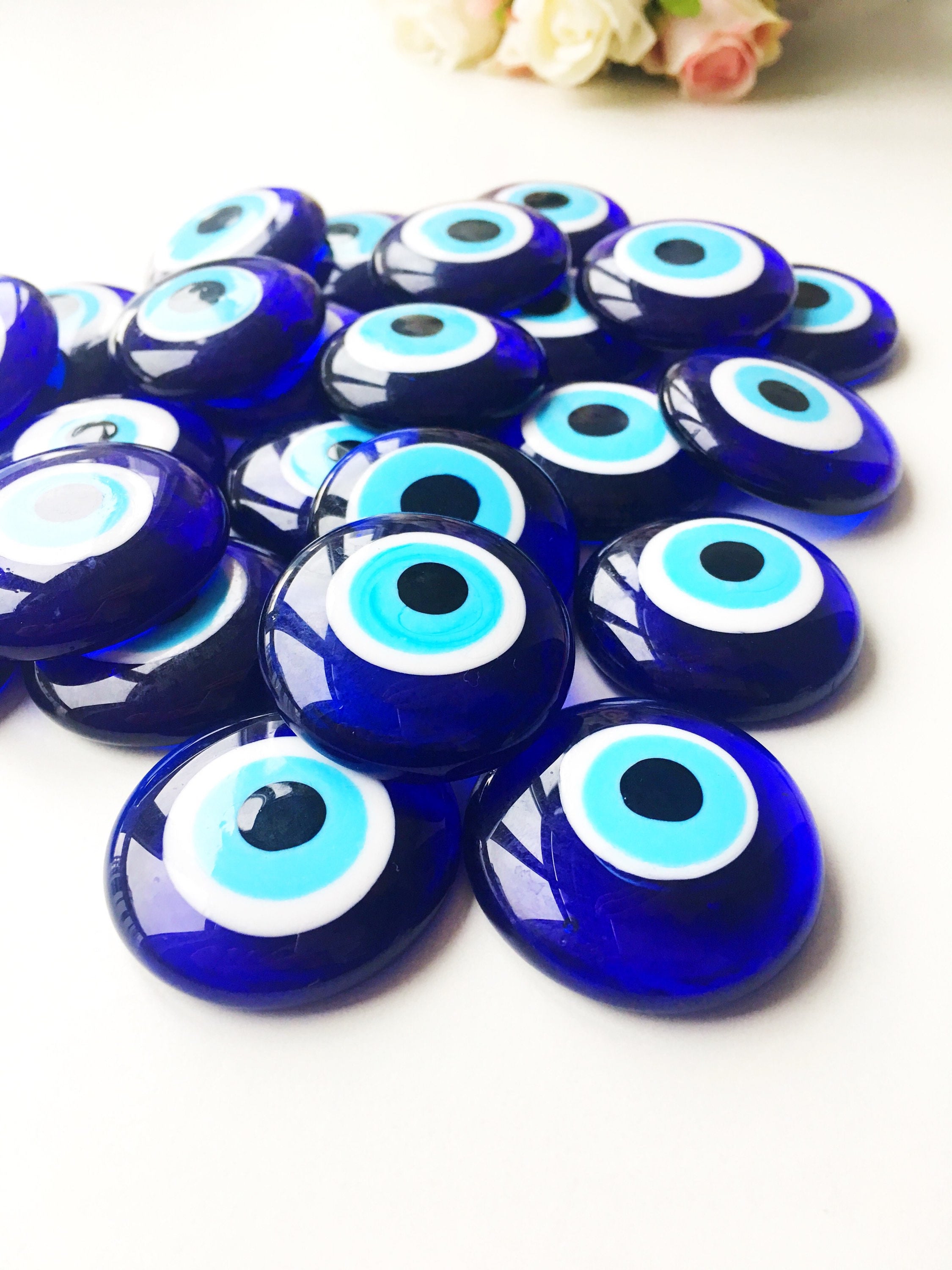 Two blue glass Nazar boncuk evil eye beads, 4cm each, with no hole, perfect for home decor and protection against negativity.