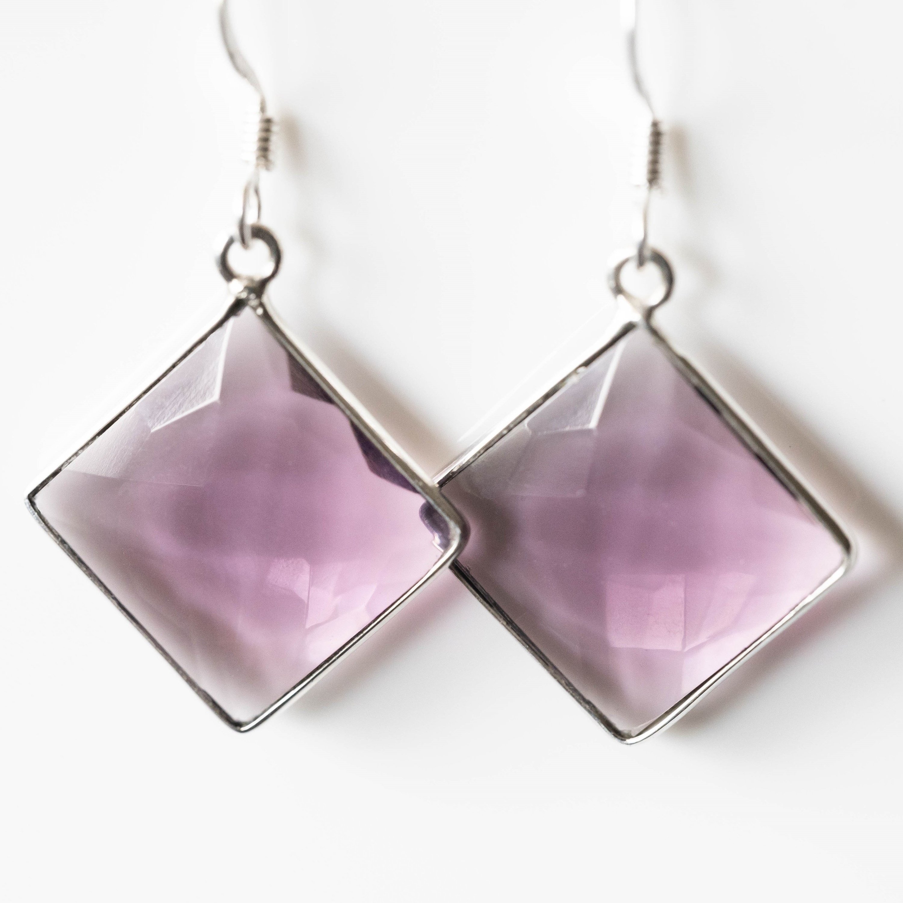 Nelly Amethyst Square Drop Earrings featuring purple amethyst stones set in 925 sterling silver with a modern square drop design.