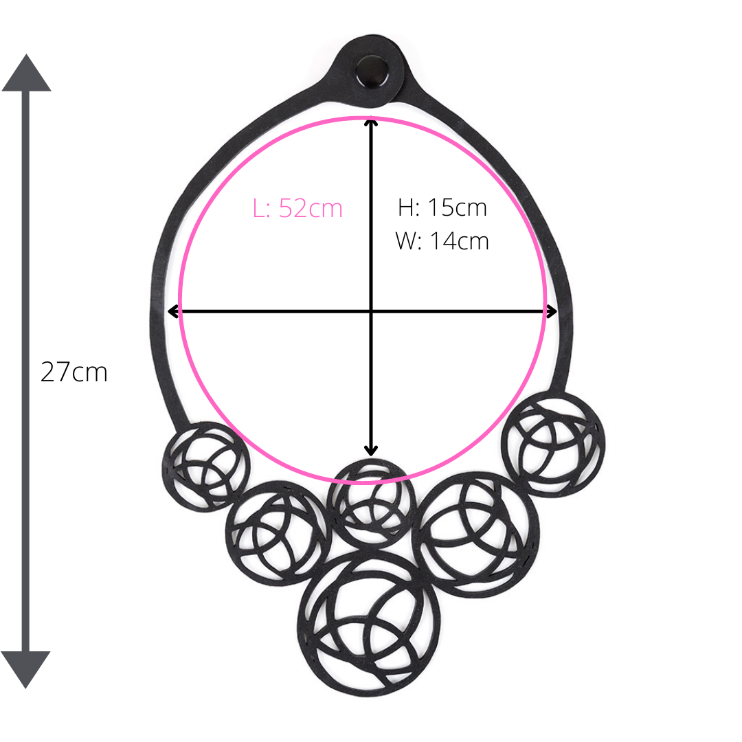 Neptune Black Necklace made from reclaimed rubber inner tubes, featuring a modern design and lightweight construction.