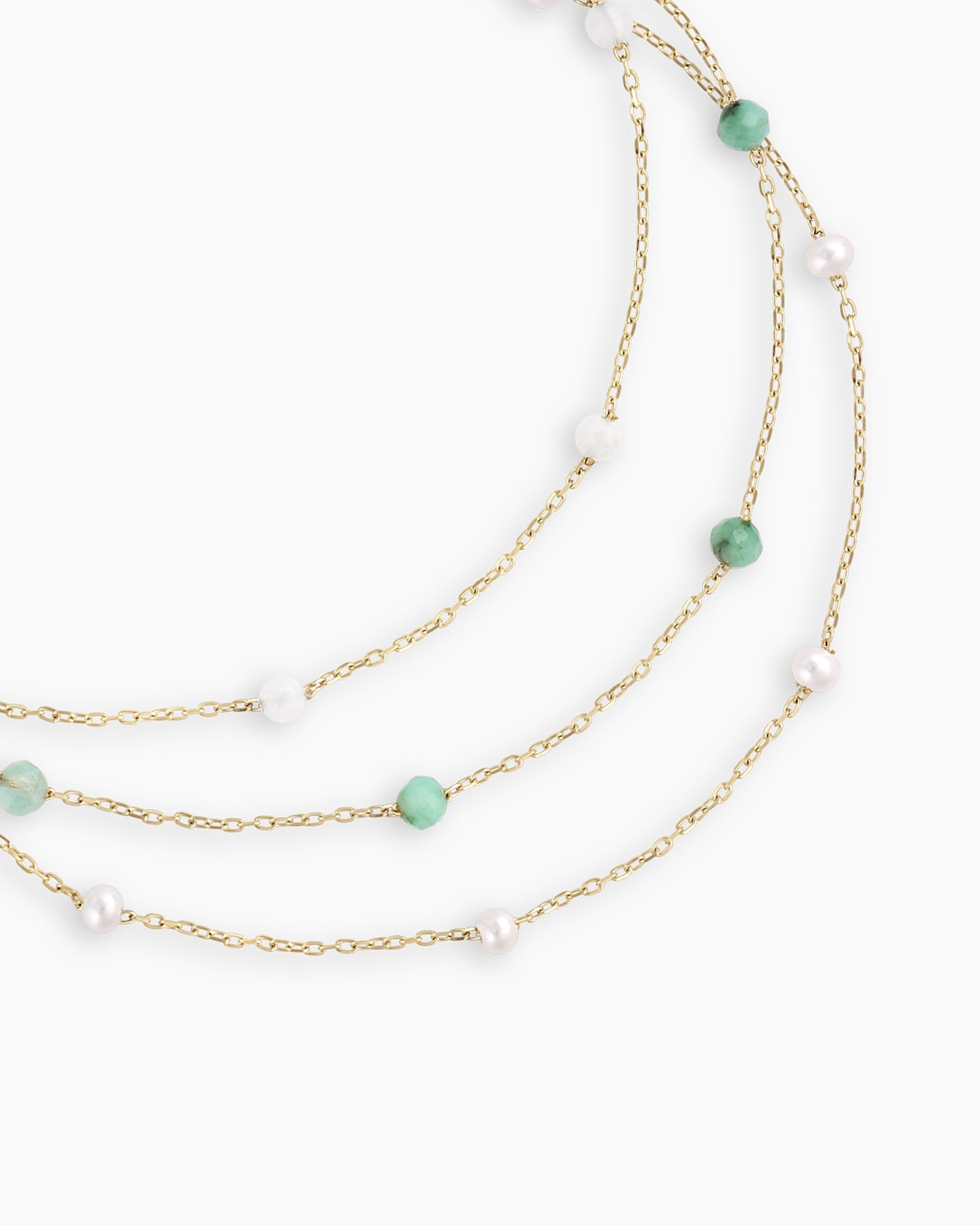 A delicate Newport Birthstone Bracelet made of 14k gold featuring a customizable birthstone, elegantly designed for layering and personal style.