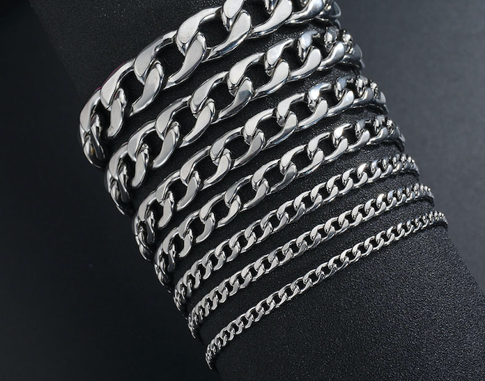 NK chain bracelet made of stainless steel, showcasing its sleek design and various thickness options.