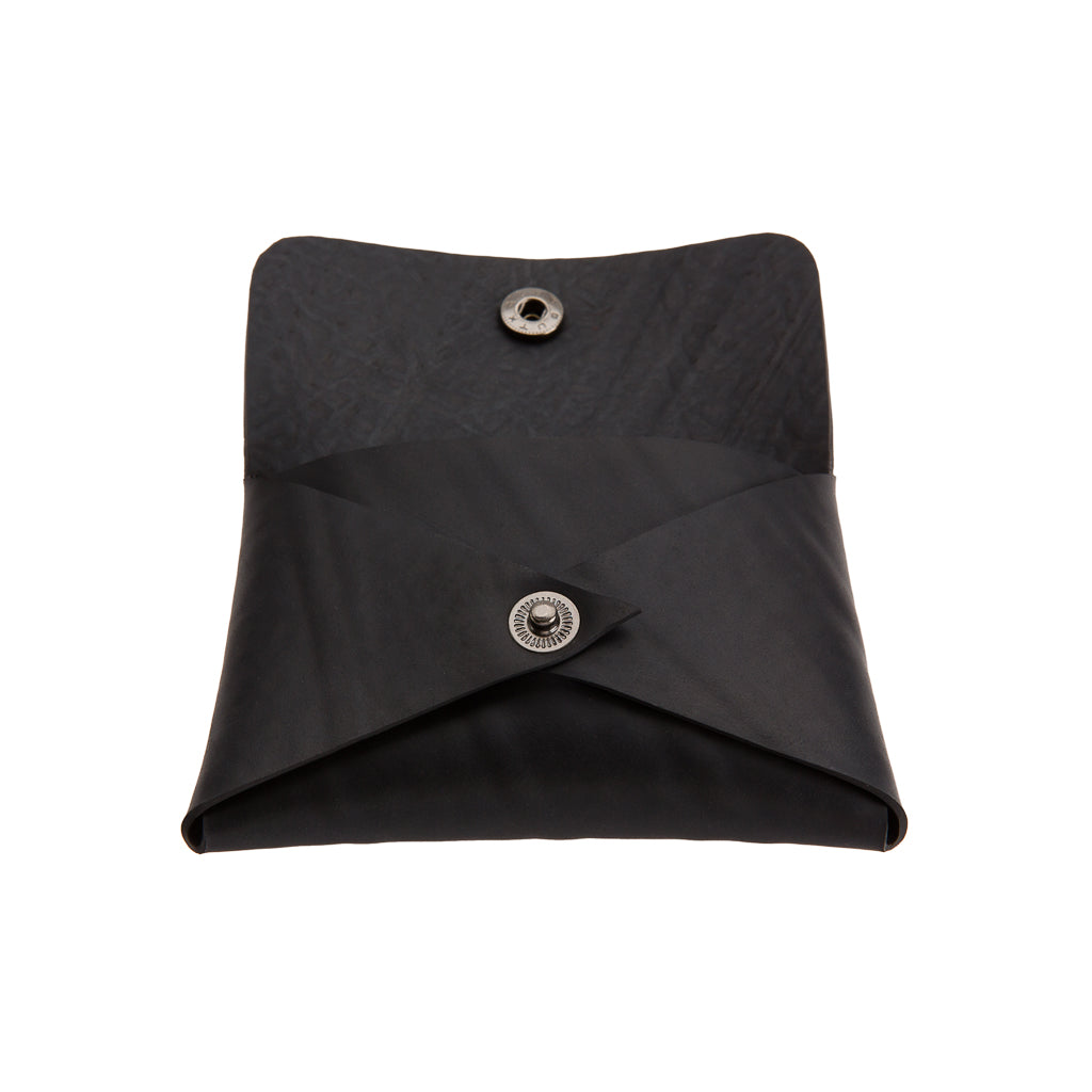 Noah Recycled Rubber Vegan Card Holder showcasing its unique texture and metal button clasp.