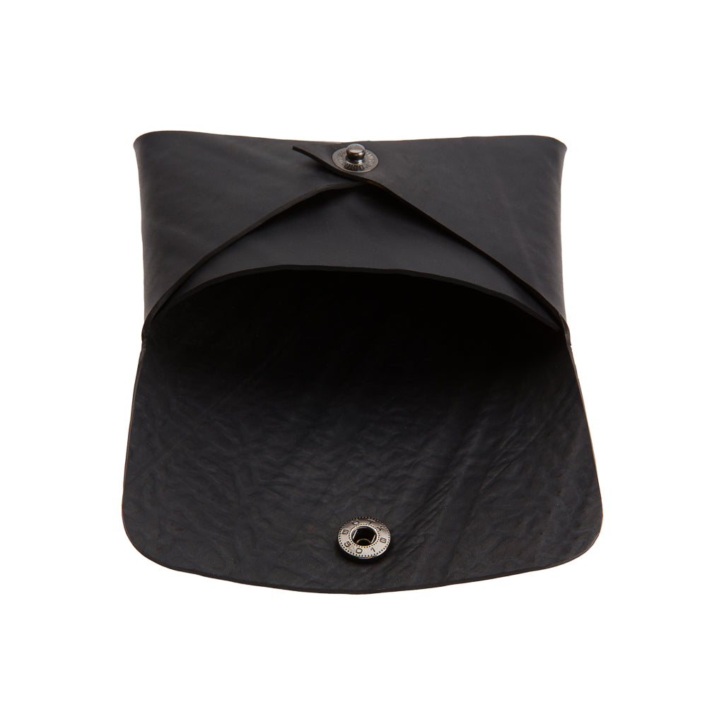 Noah Recycled Rubber Vegan Card Holder showcasing its unique texture and metal button clasp.