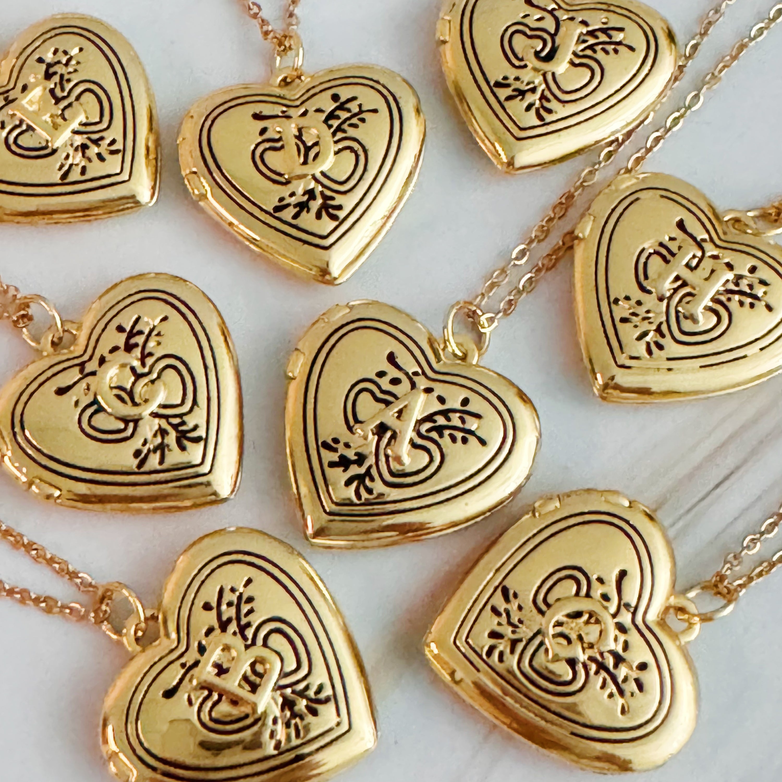 Nostalgic Heart Initial Open Locket Necklace featuring a heart-shaped locket on a stainless steel chain, elegantly designed for sentimental keepsakes.