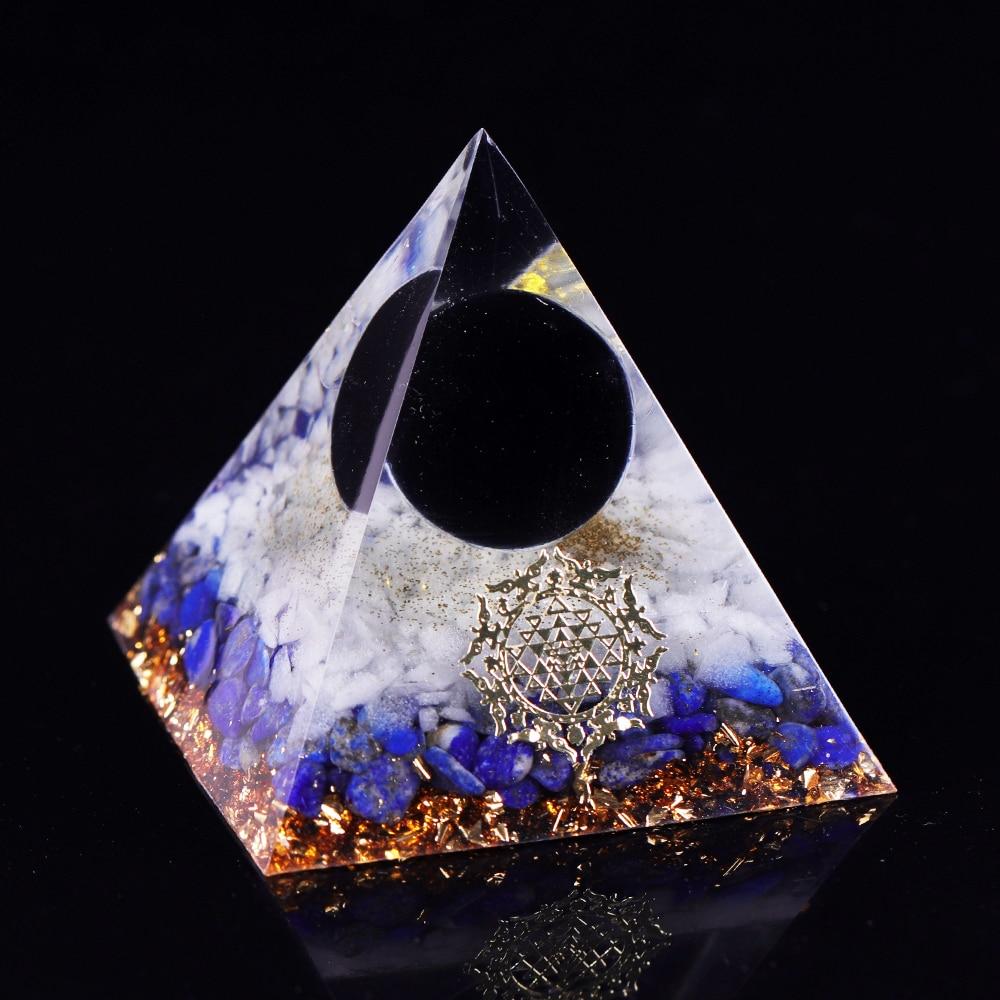 Obsidian Sphere Orgone Pyramid featuring Lapis Lazuli, crafted with copper and gold foil, showcasing a unique design.