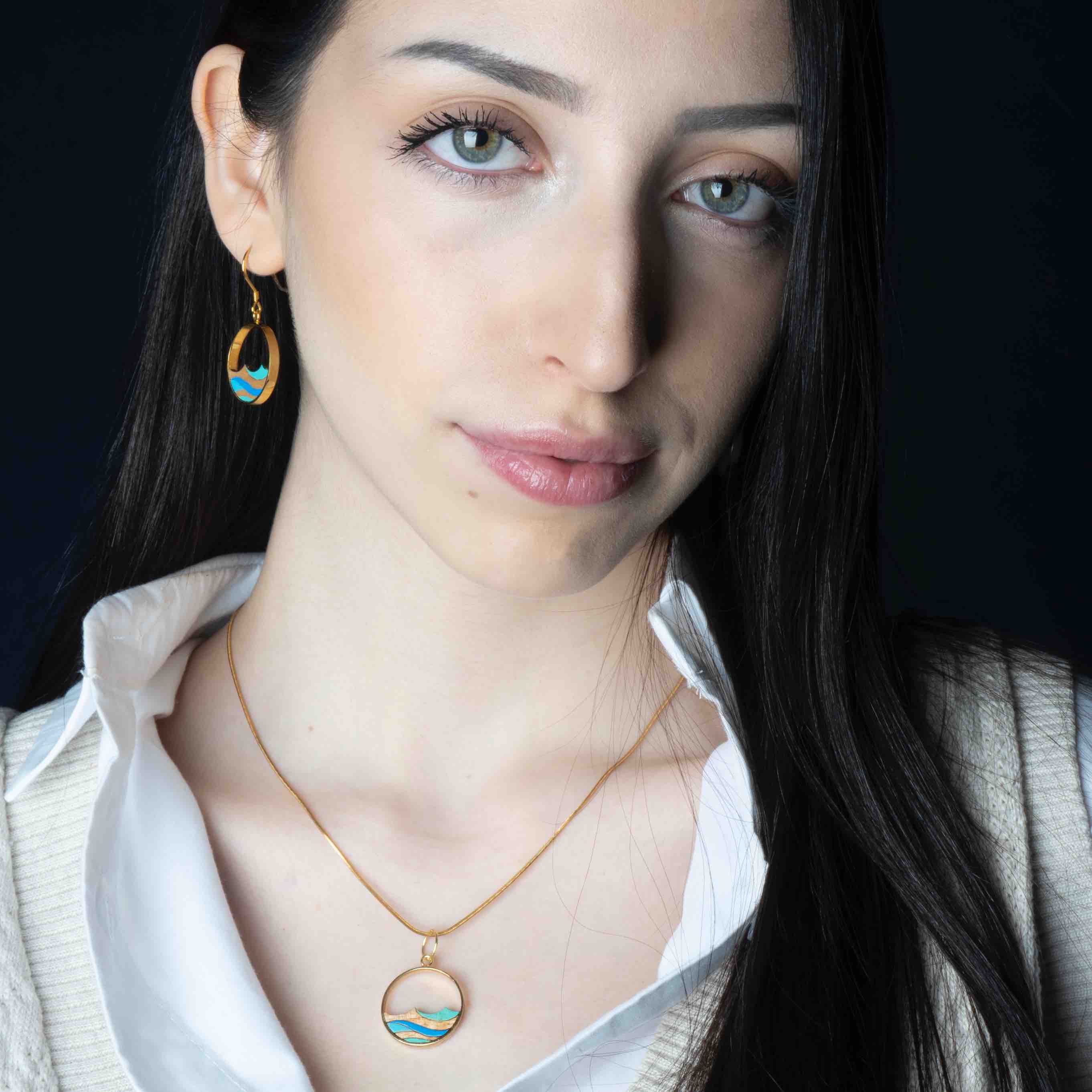 Ocean Recycled Wood Gold Necklace featuring a unique wooden pendant and 24K gold plated chain, elegantly displayed in a luxury gift box.